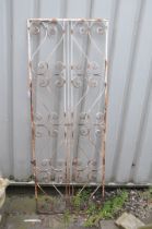 A MODERN WROUGHT IRON PANEL with scrolled and linear detail width 62cm height 165cm