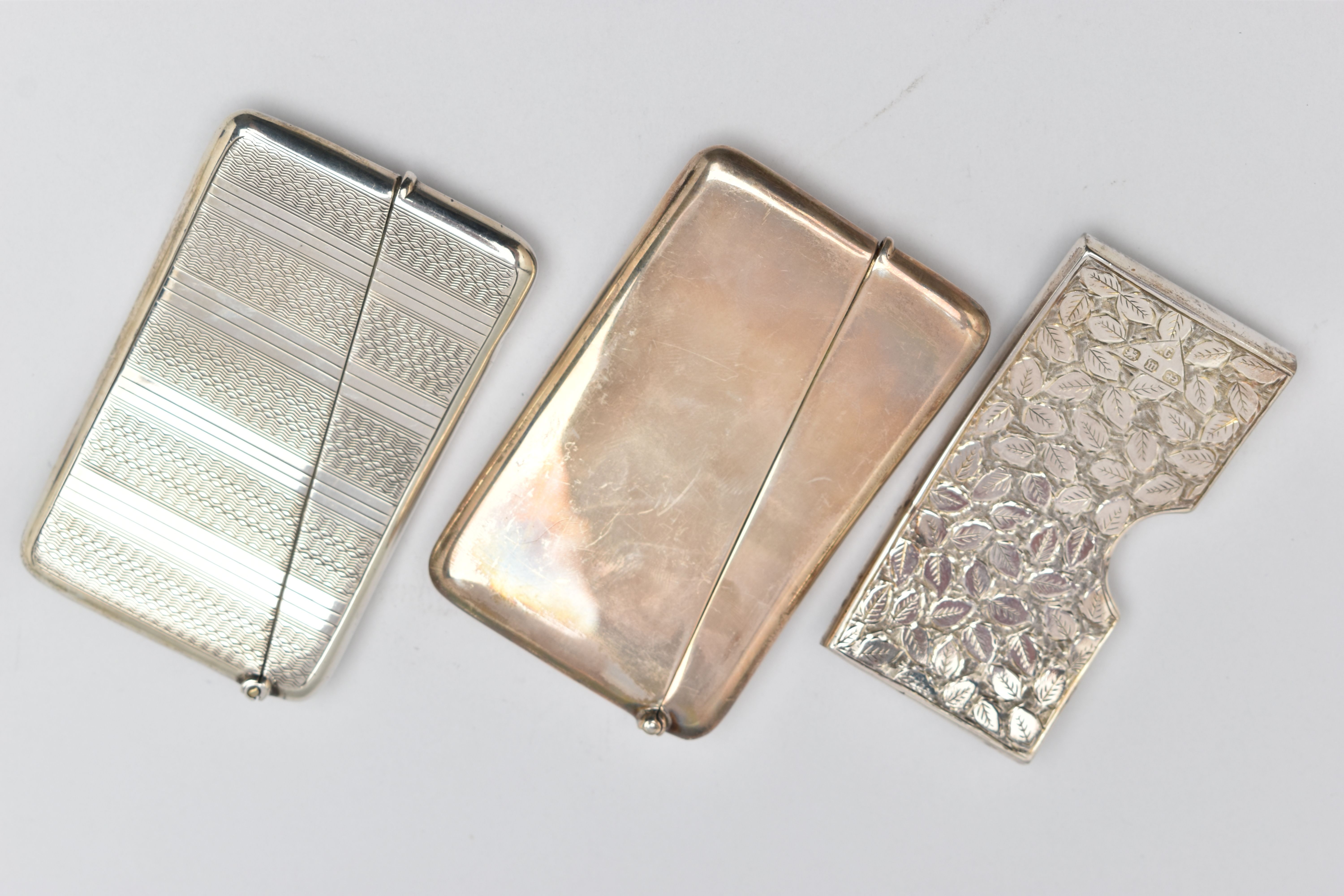THREE LATE 19TH TO EARLY 20TH CENTURY SILVER CARD CASES, all of rectangular outline, two with hinged - Image 2 of 3