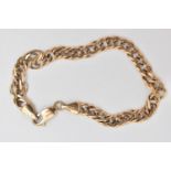 A 9CT GOLD BRACELET, double curb link bracelet, fitted with a lobster clasp, approximate length