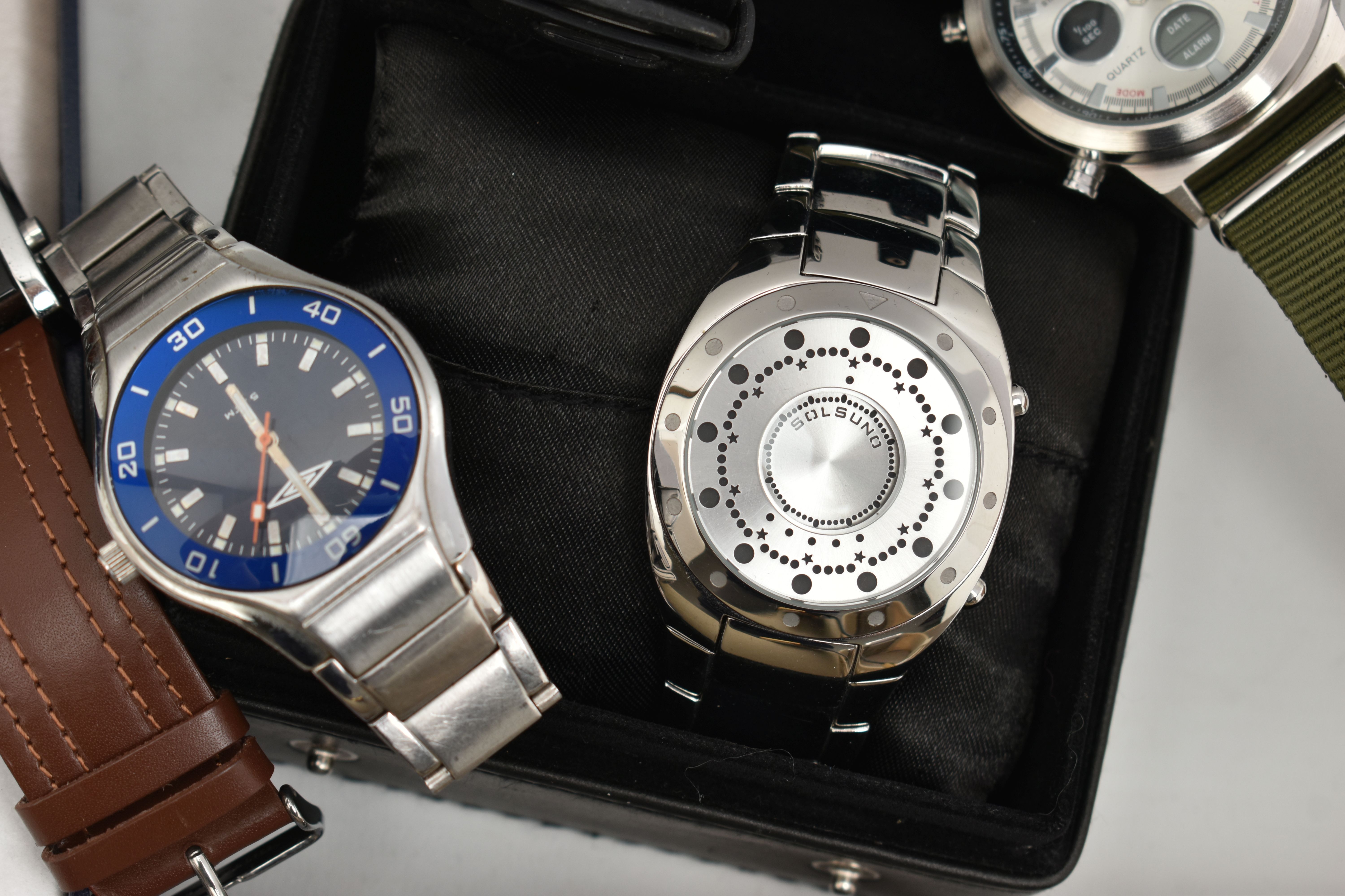 AN ASSORTMENT OF WRISTWATCHES, to include a gold plated 'Swatch Irony' wristwatch SR726SW, a ' - Image 6 of 7