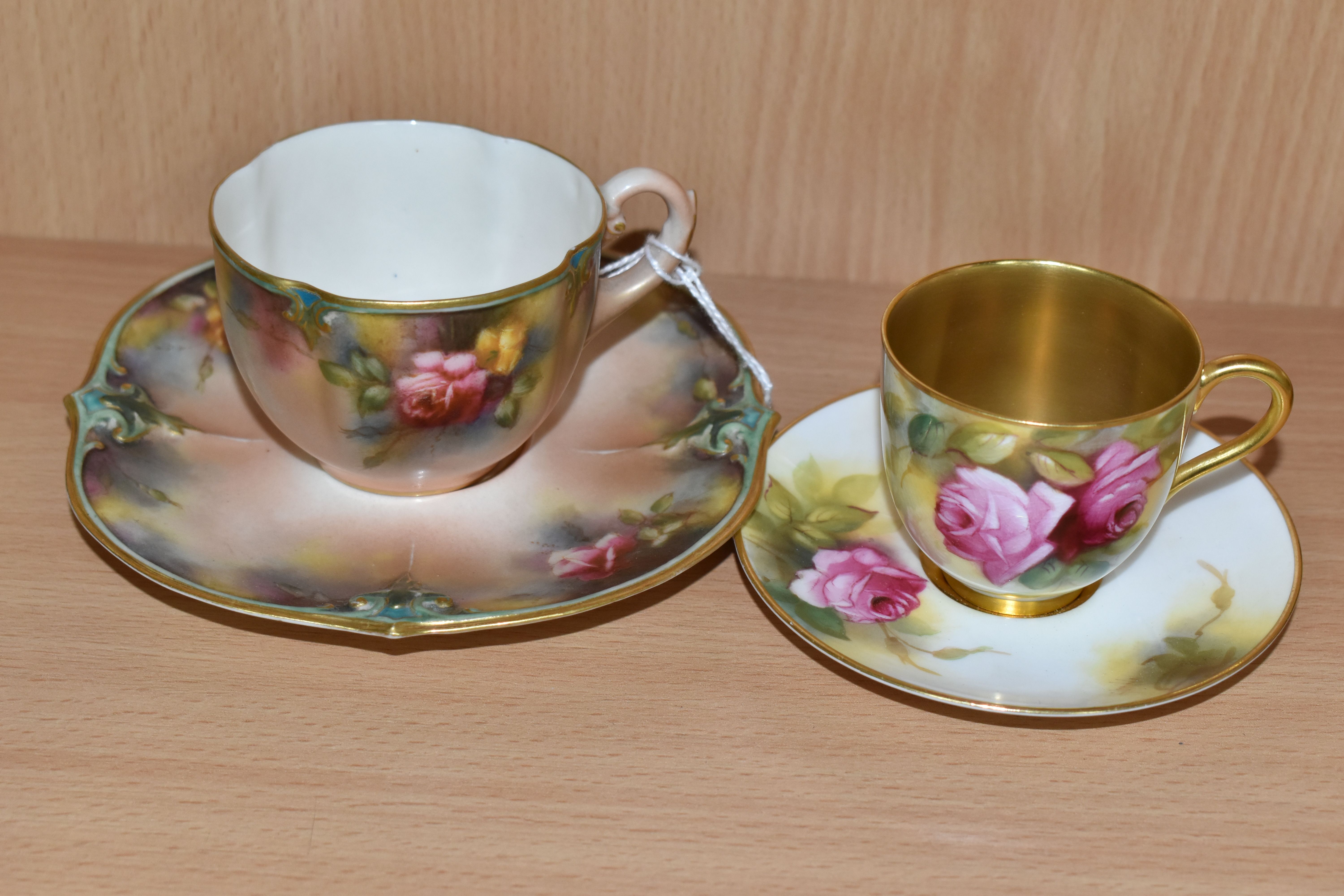 A ROYAL WORCESTER CABINET CUP AND SAUCER, WITH A JAMES HADLEY & SONS TEACUP AND SAUCER, comprising a