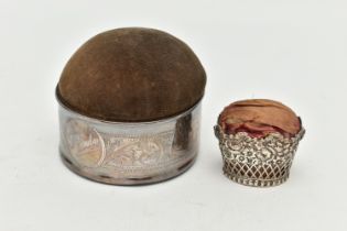 TWO PIN CUSHIONS, the first a circular form silver pin cushion with acanthus scrolled detail with
