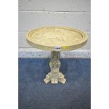 A SMALL IVORINE CIRCULAR TABLE, the top with people riding a horse drawn carriage, the pedestal with