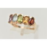 A 9CT GOLD MULTI GEM SET RING, designed as a row of five oval cut stones to include garnet, citrine,