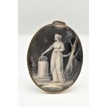 A DOUBLE PHOTO LOCKET, gilt metal, of an oval form, one side depicting a lady in profile, the