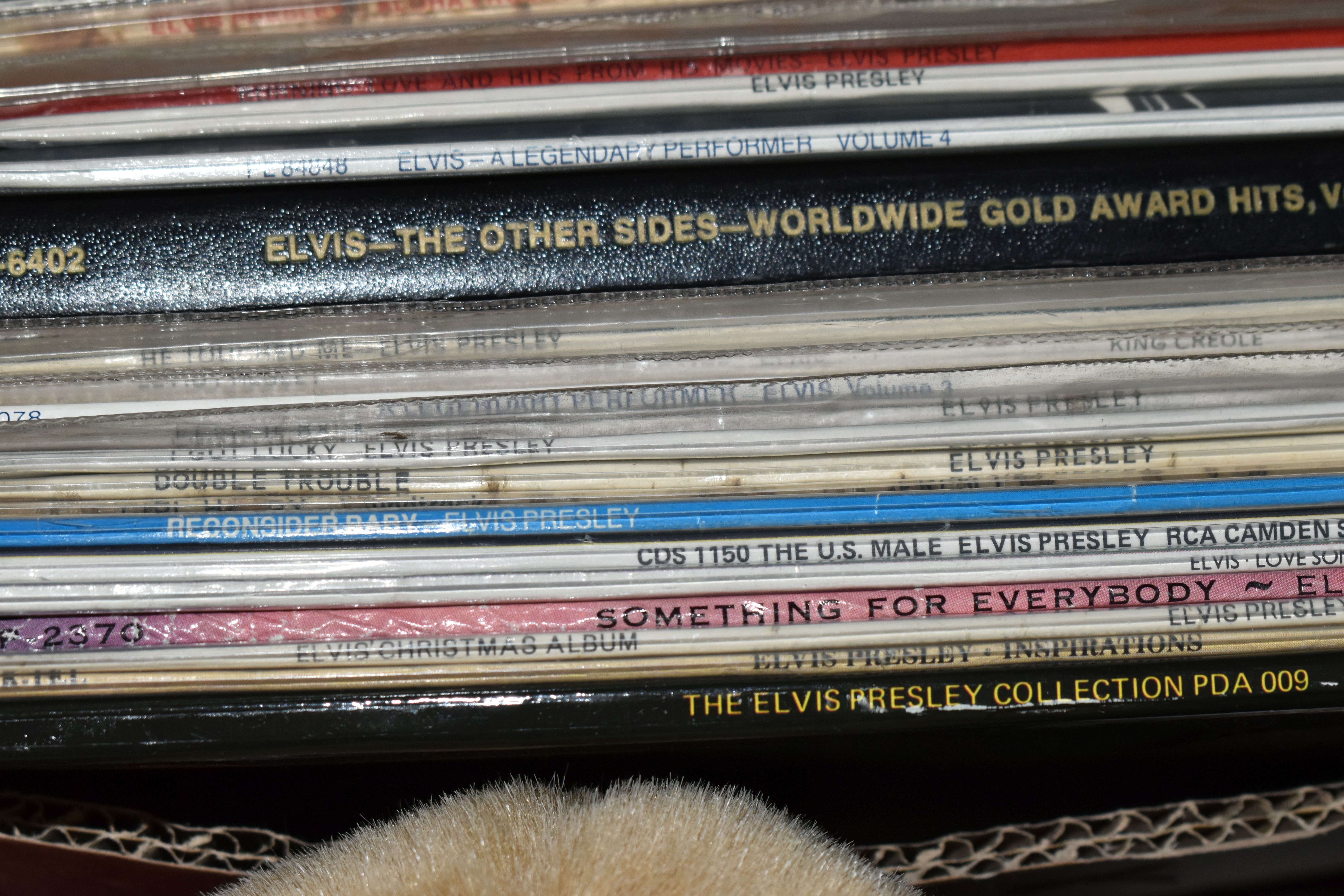 TWO BOXES OF ELVIS PRESLEY LP RECORDS, FILMS AND MEMORABILIA, to include a framed collector's - Image 4 of 5