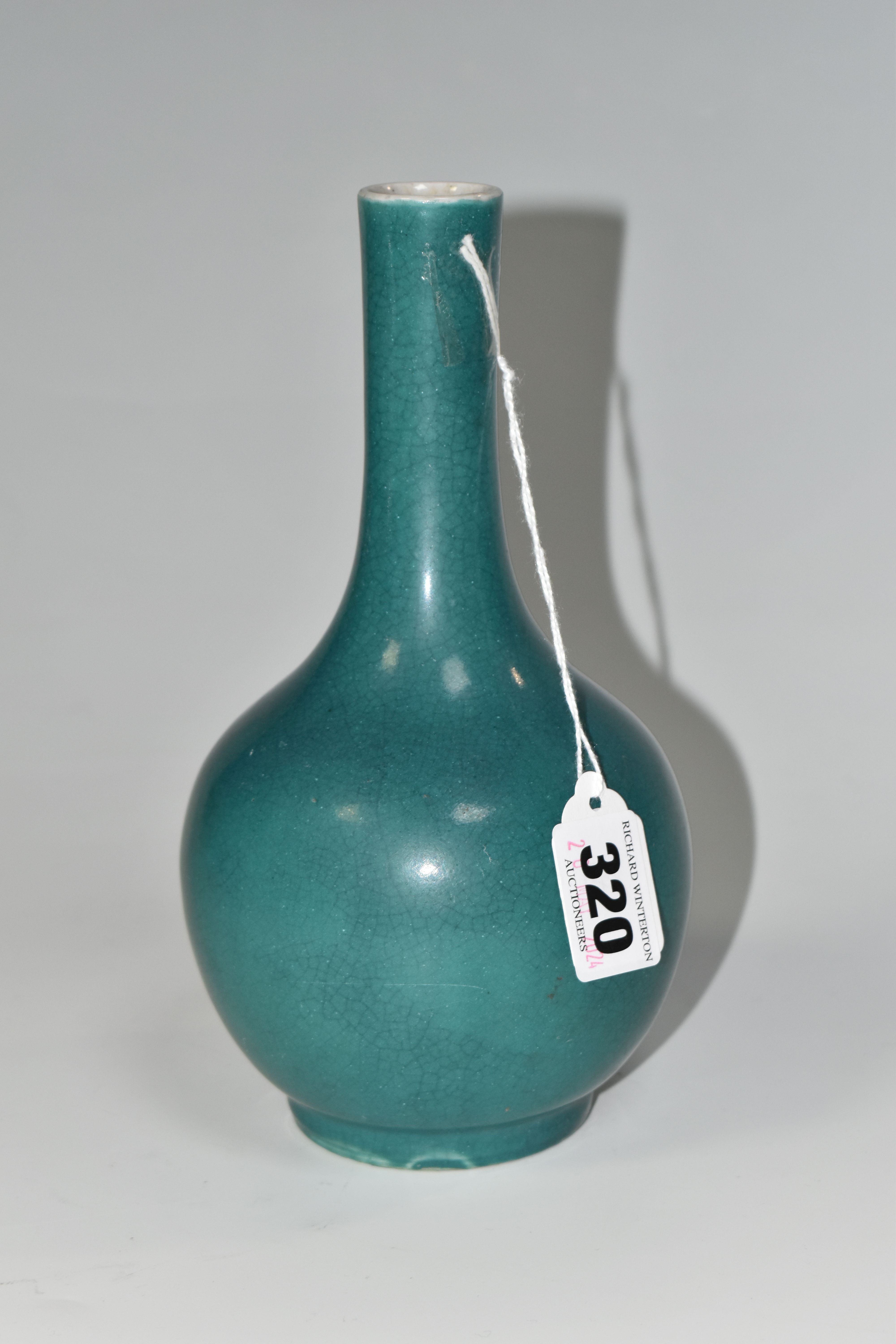 A NINETEENTH CENTURY CHINESE ONION SHAPED CRACKLE VASE, with turquoise glaze, four character marks