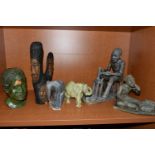 A COLLECTION OF SIX AFRICAN STONE AND TREEN FIGURAL CARVINGS, comprising two sculpted as men, one