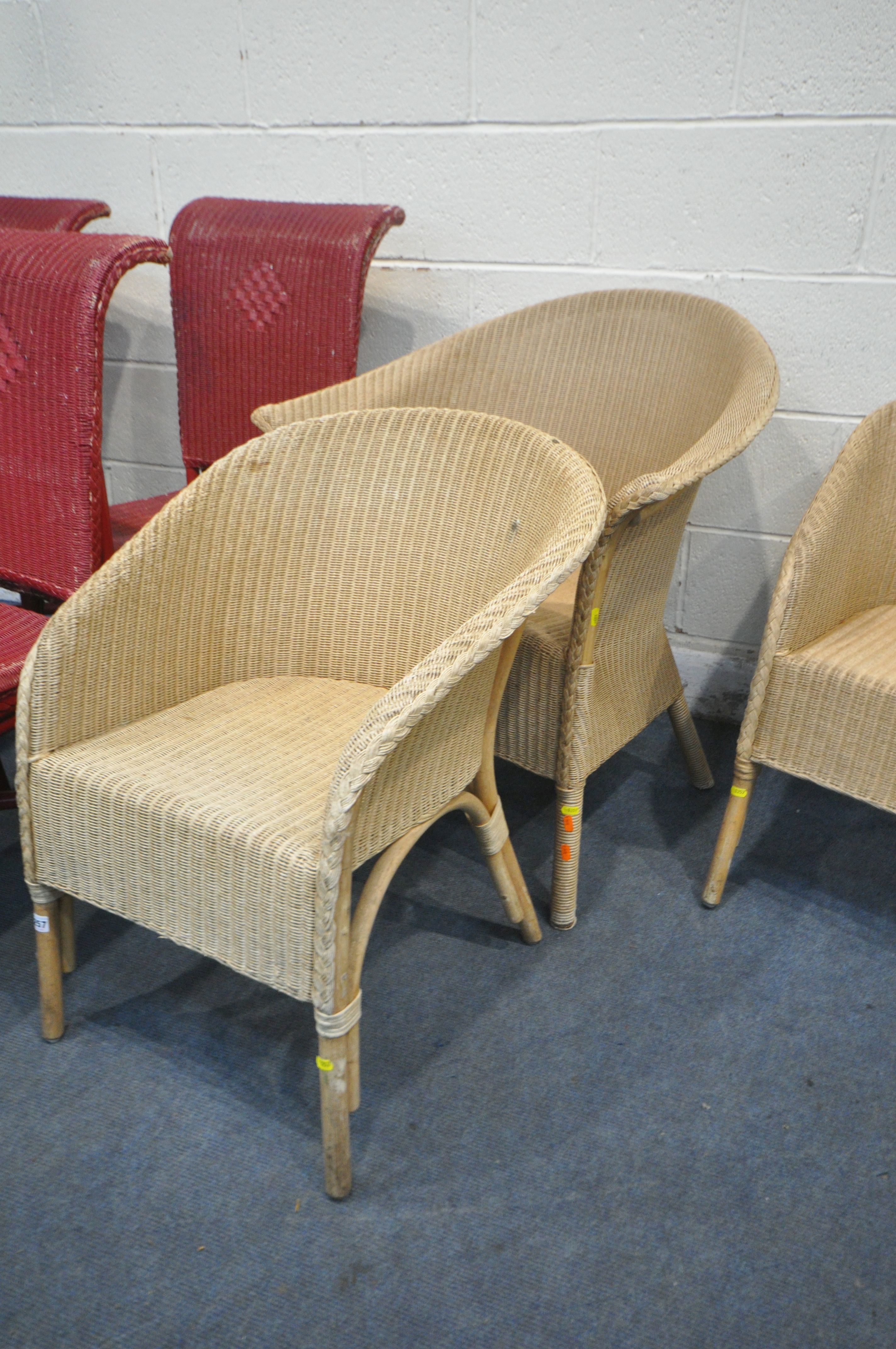 A LLOYD LOOM WICKER BASKET CHAIR, along with three cream Lloyd loom style chairs, and four red - Image 2 of 3