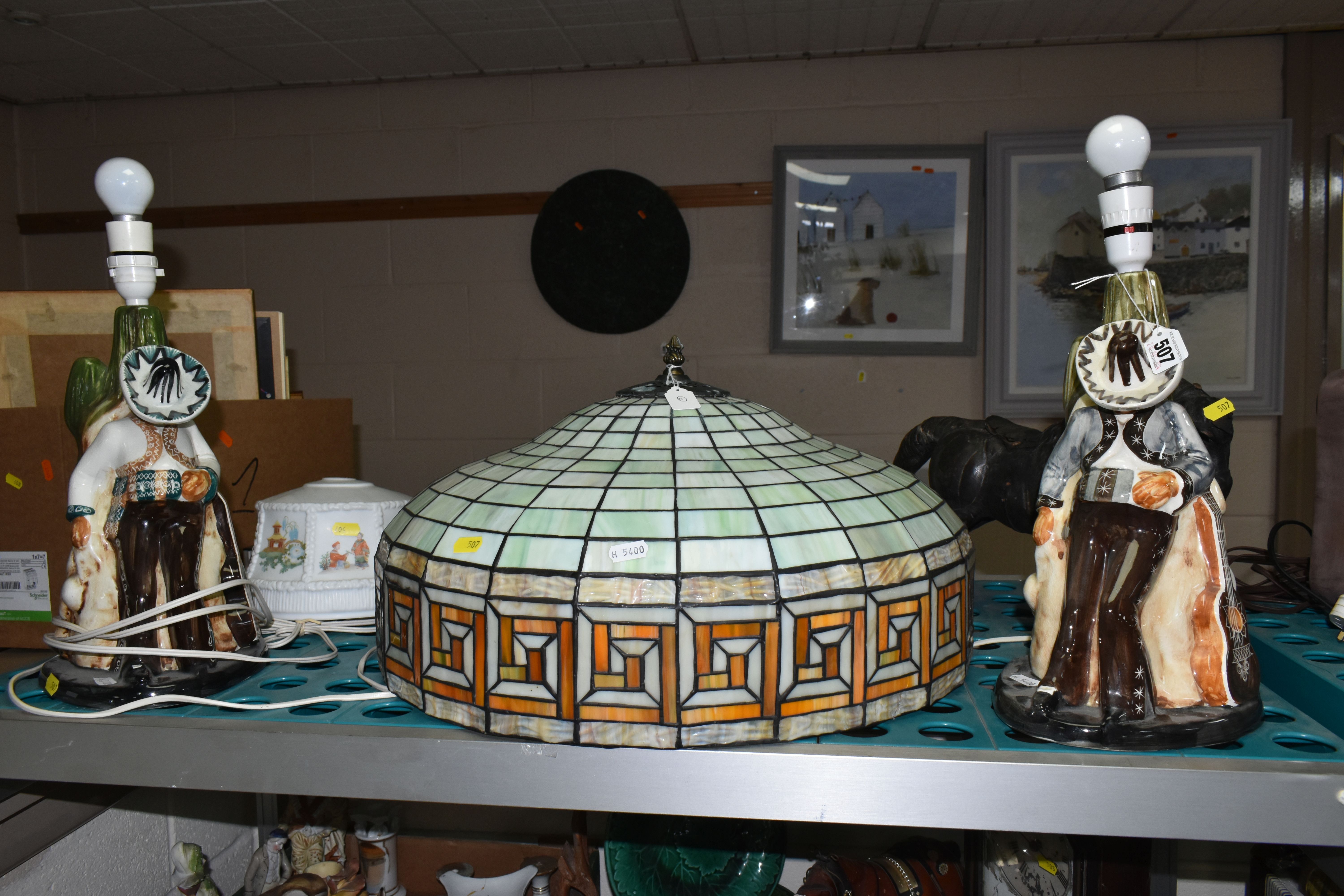 A GROUP OF TABLE LAMPS AND A TIFFANY STYLE CEILING LIGHT SHADE, comprising two Jersey Pottery