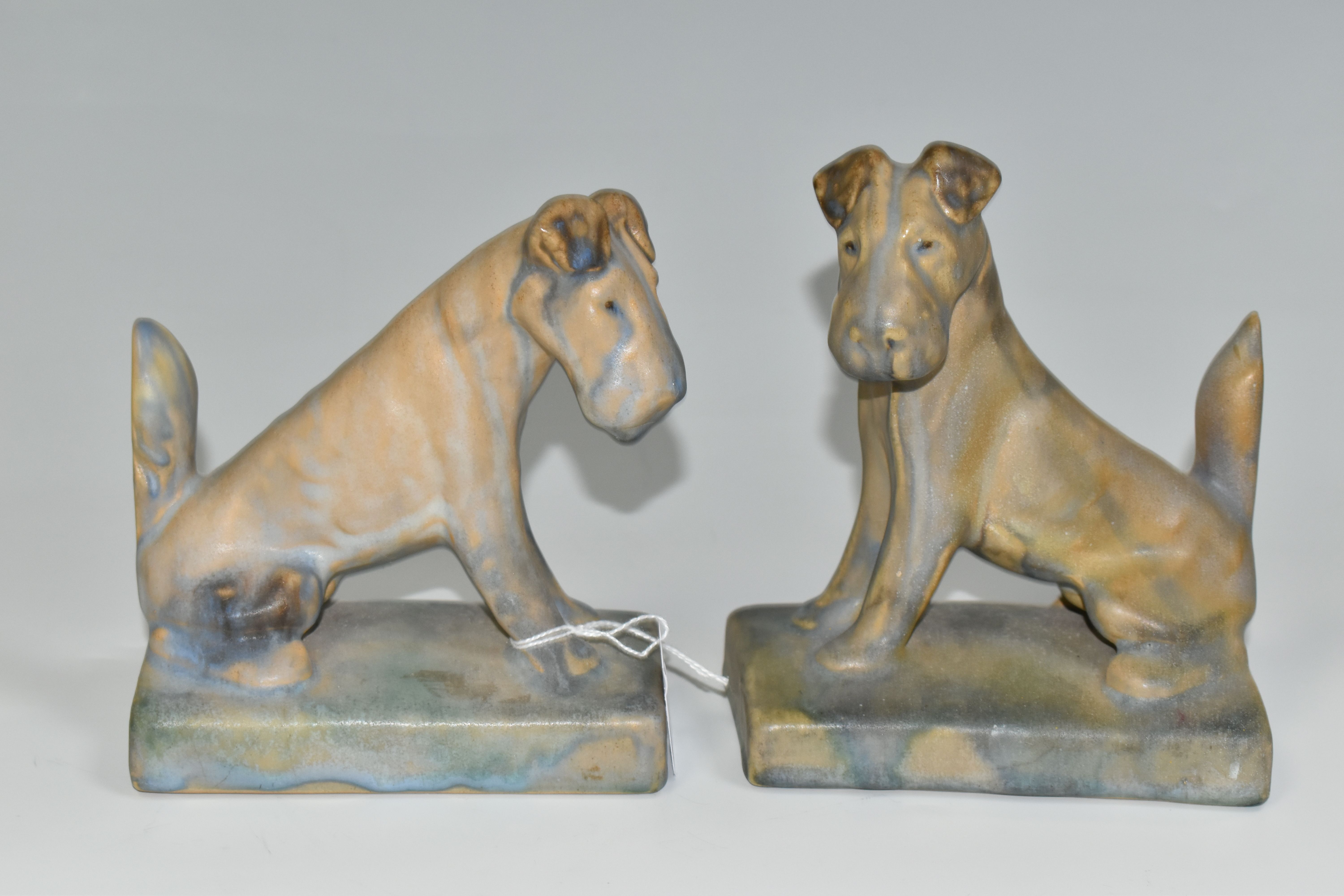 A PAIR OF BOURNE DENBY TERRIER BOOKENDS, 1920s-1930s Danesby Ware, printed marks to base, height