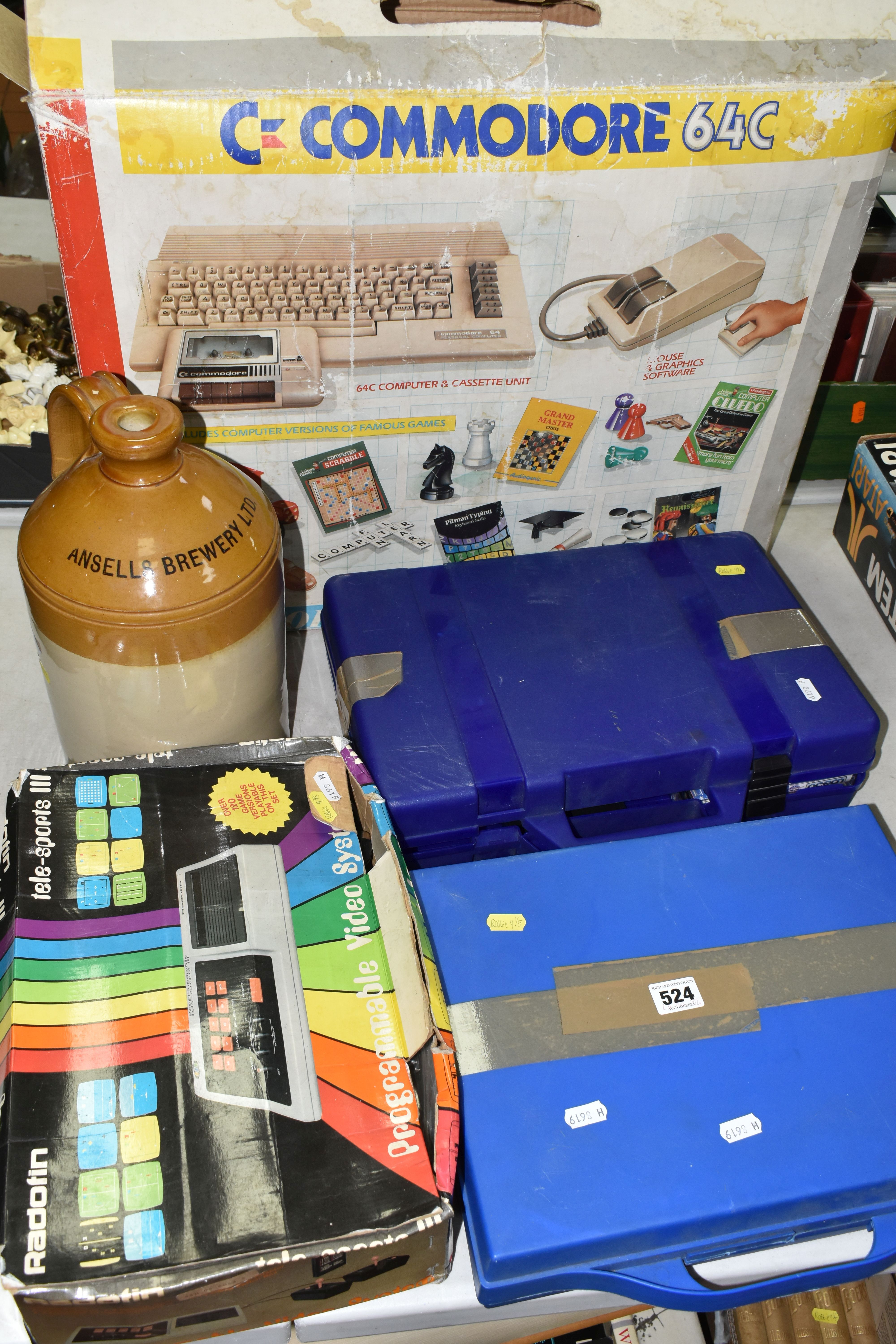 COMMODORE 64 COMPUTER BOXED WITH GAMES, computer is in working condition (see photo, television