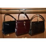 THREE LADIES' VINTAGE HANDBAGS, comprising a brown French faux Croc bag, a claret patent leather