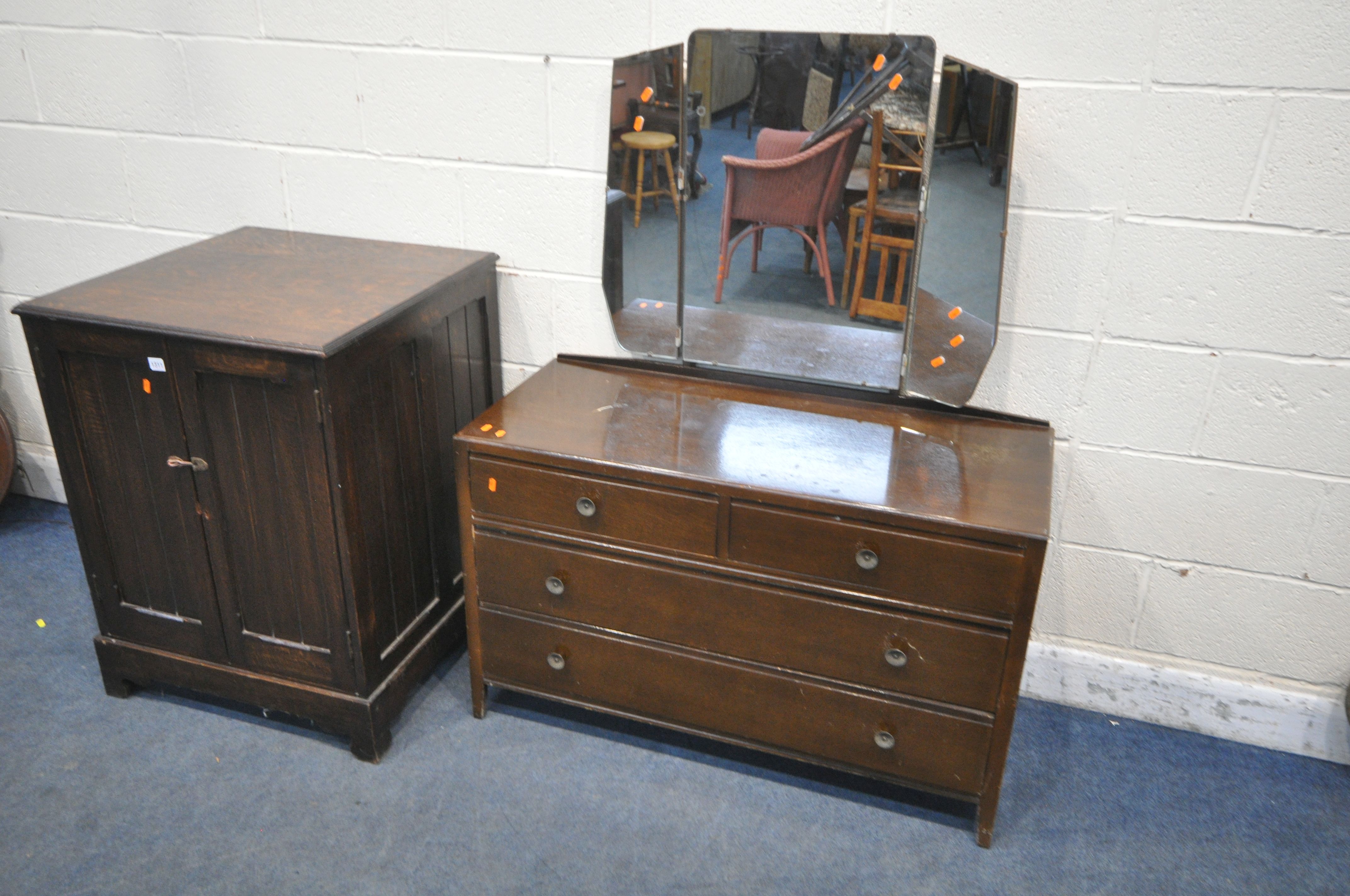 AN OAK PANELLED TWO DOOR CUPBOARD, 67cm squared x height 89cm, and an oak dressing chest with