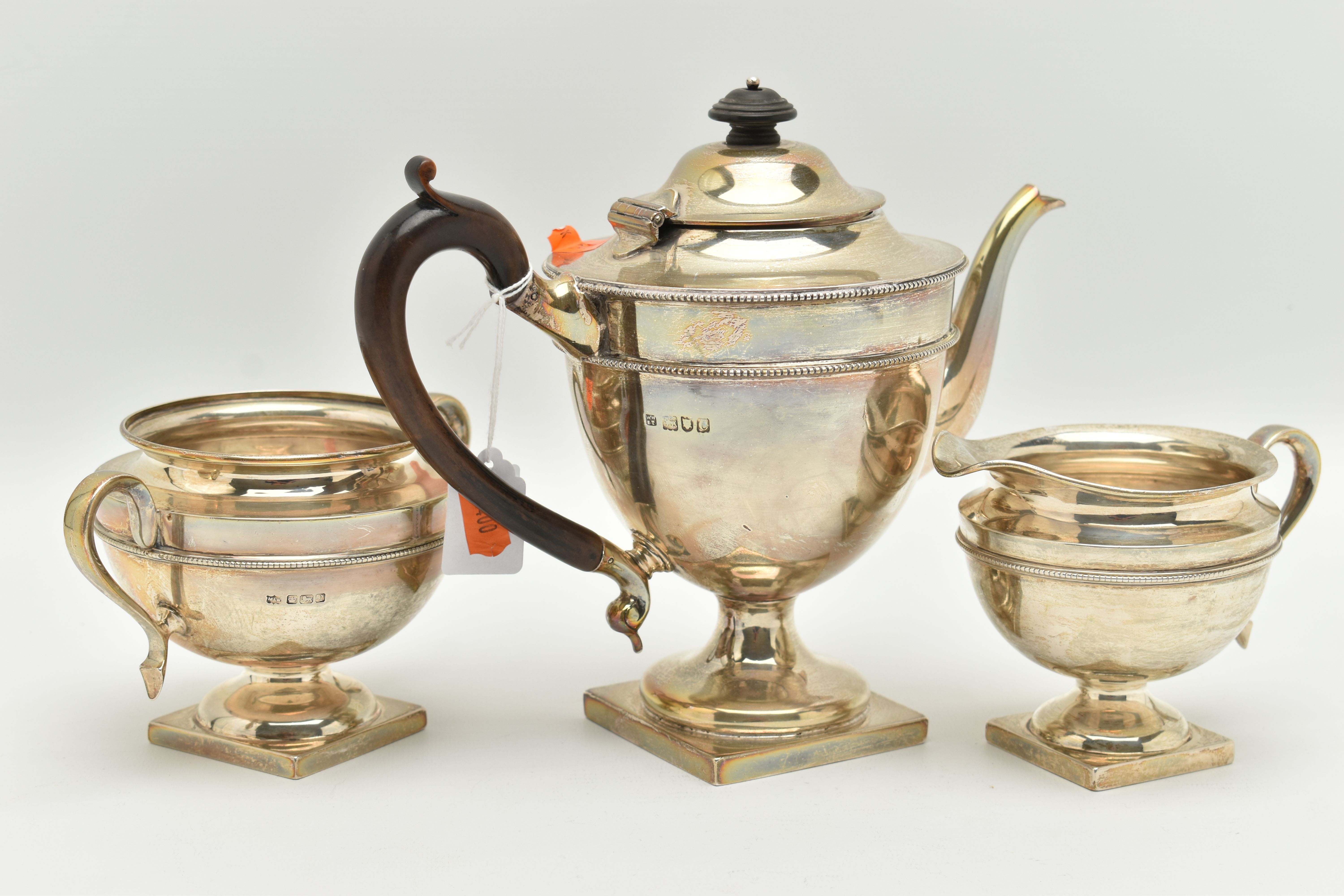 AN EARLY 20TH CENTURY SILVER THREE PIECE TEA SET, comprising of a teapot, sugar bowl and milk jug, - Image 5 of 6