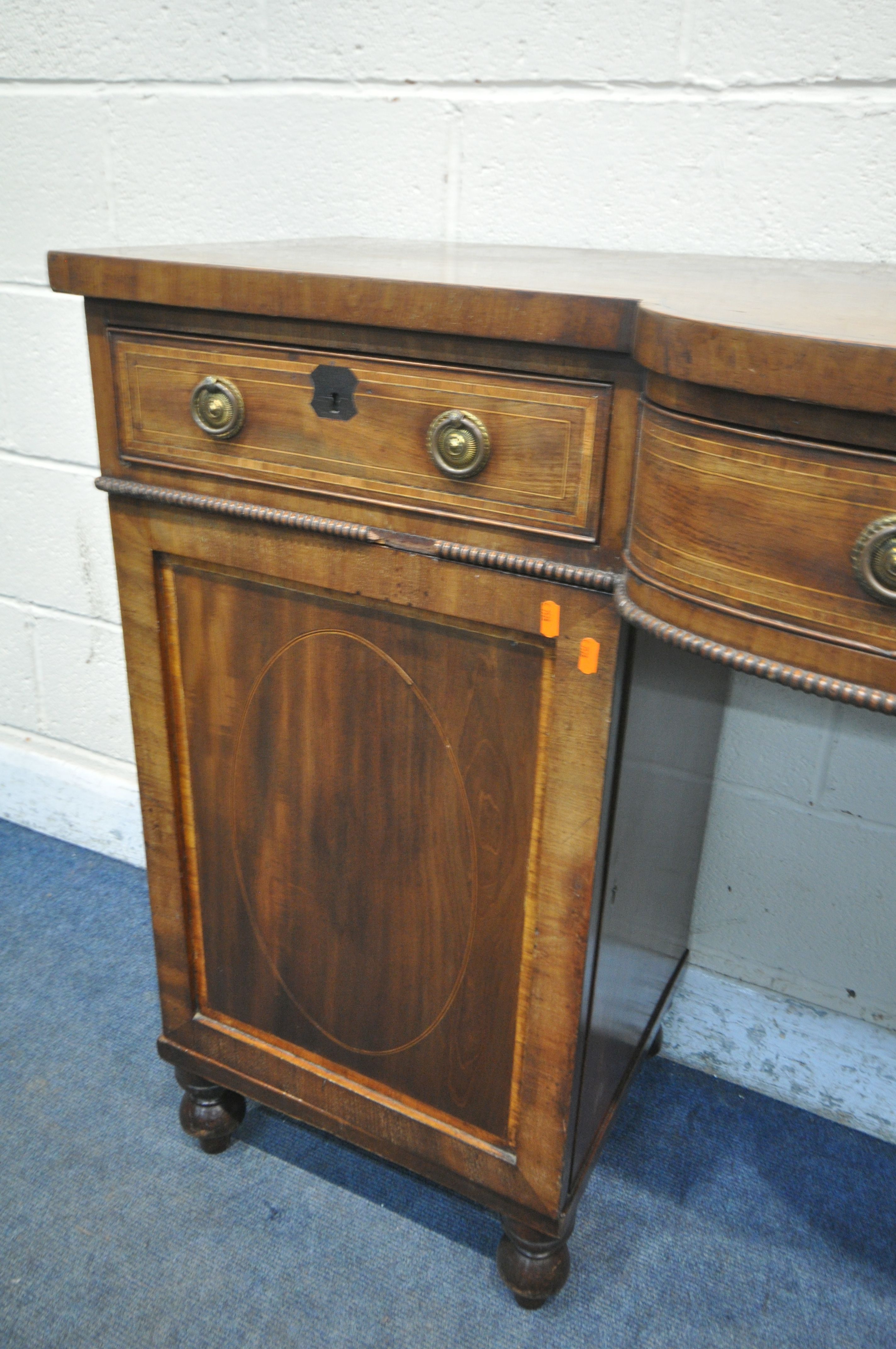 A GEORGIAN MAHOGANY AND CROSSBANDED PEDESTAL SIDEBOARD, central bowfront section, three frieze - Image 3 of 5
