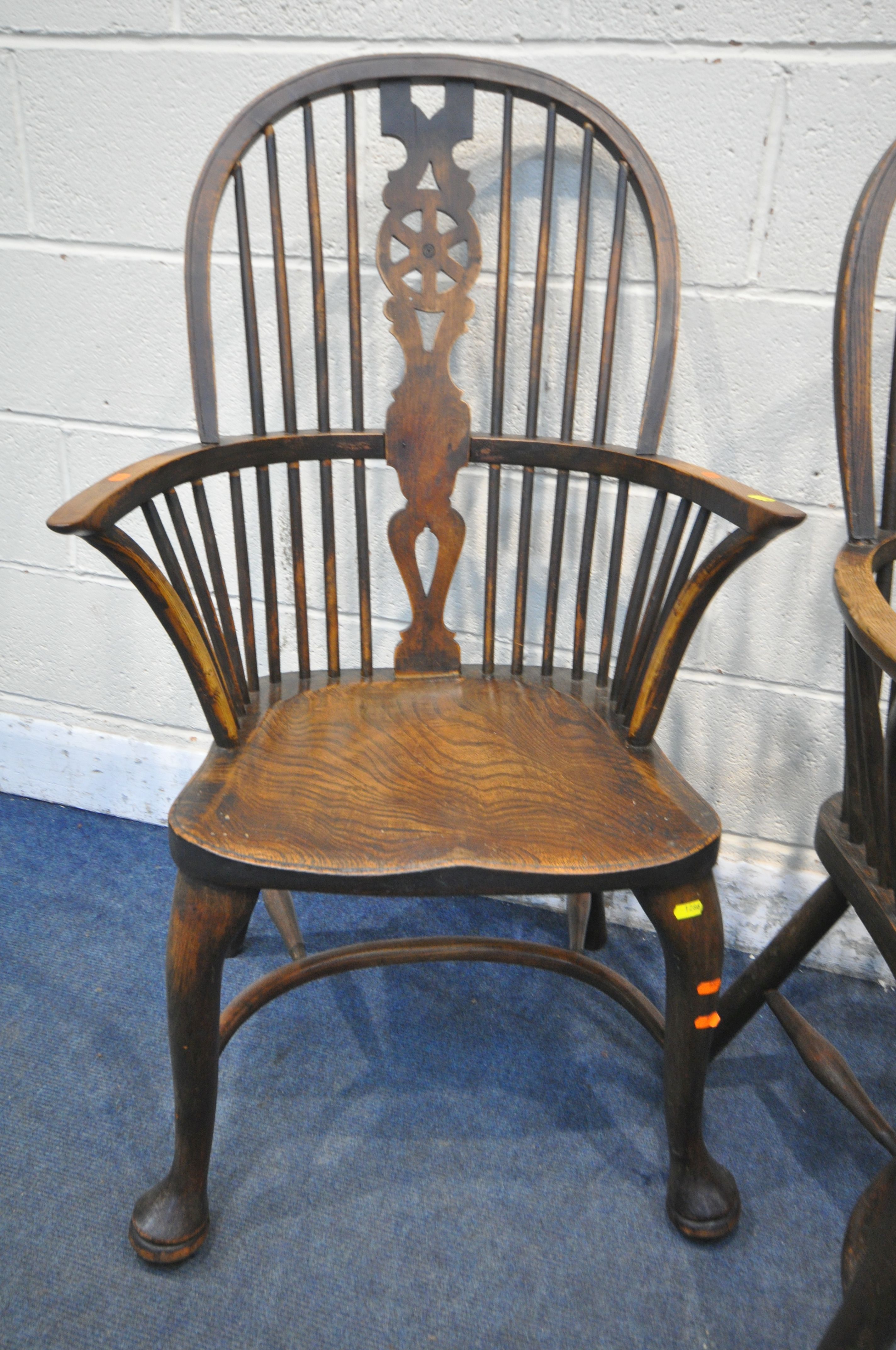 A SET OF FOUR EARLY 20TH CENTURY ELM AND BEECH HOOP BACK WINDSOR ARMCHAIR, with a wheel splat - Image 4 of 7