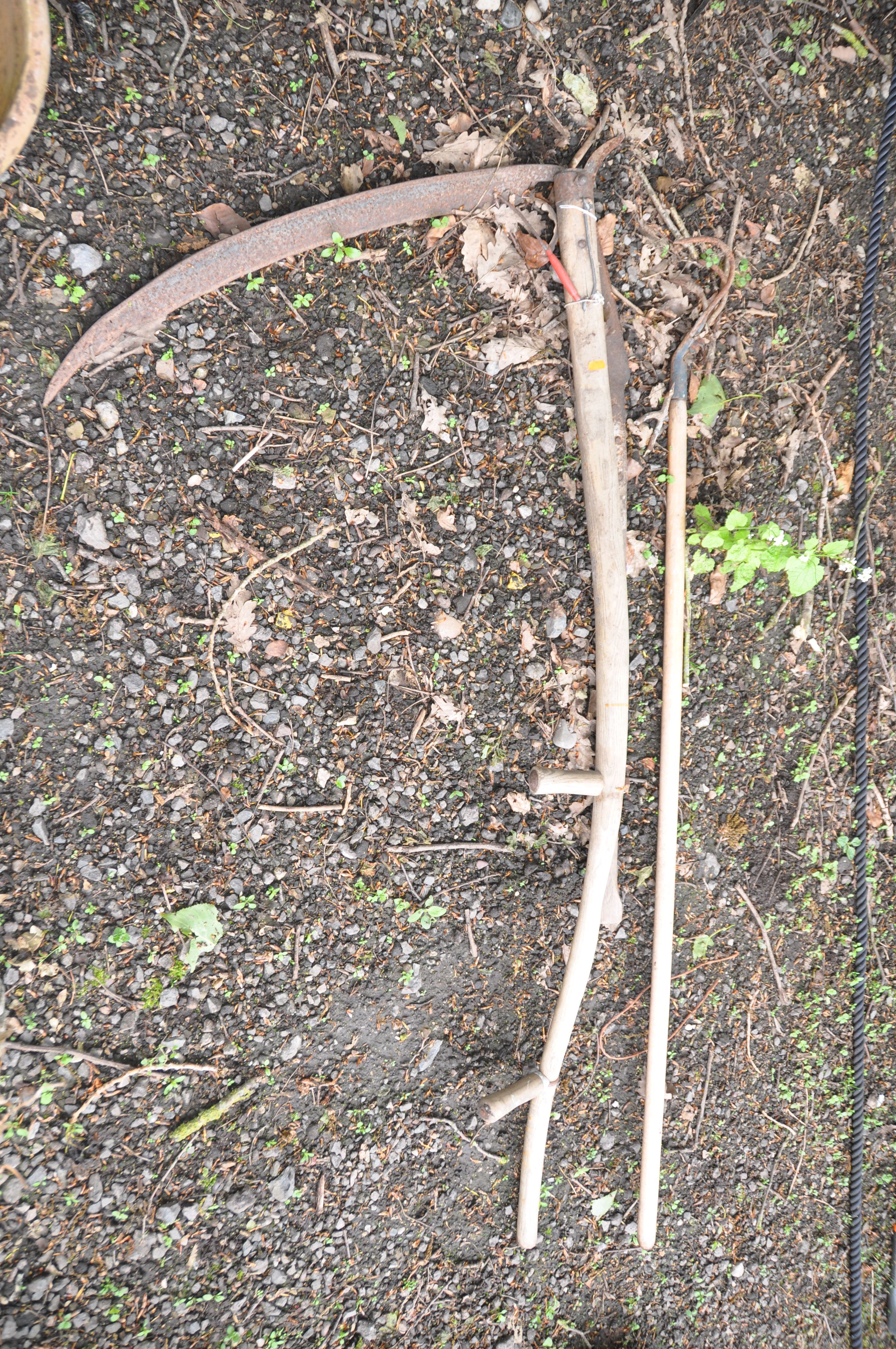 A VINTAGE GARDEN SCYTHE, a modern hay rake and a another cutting tool (3)