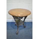 A CAST IRON CIRCULAR PUB TABLE, with a walnut top, diameter 61cm x height 70cm (condition report: