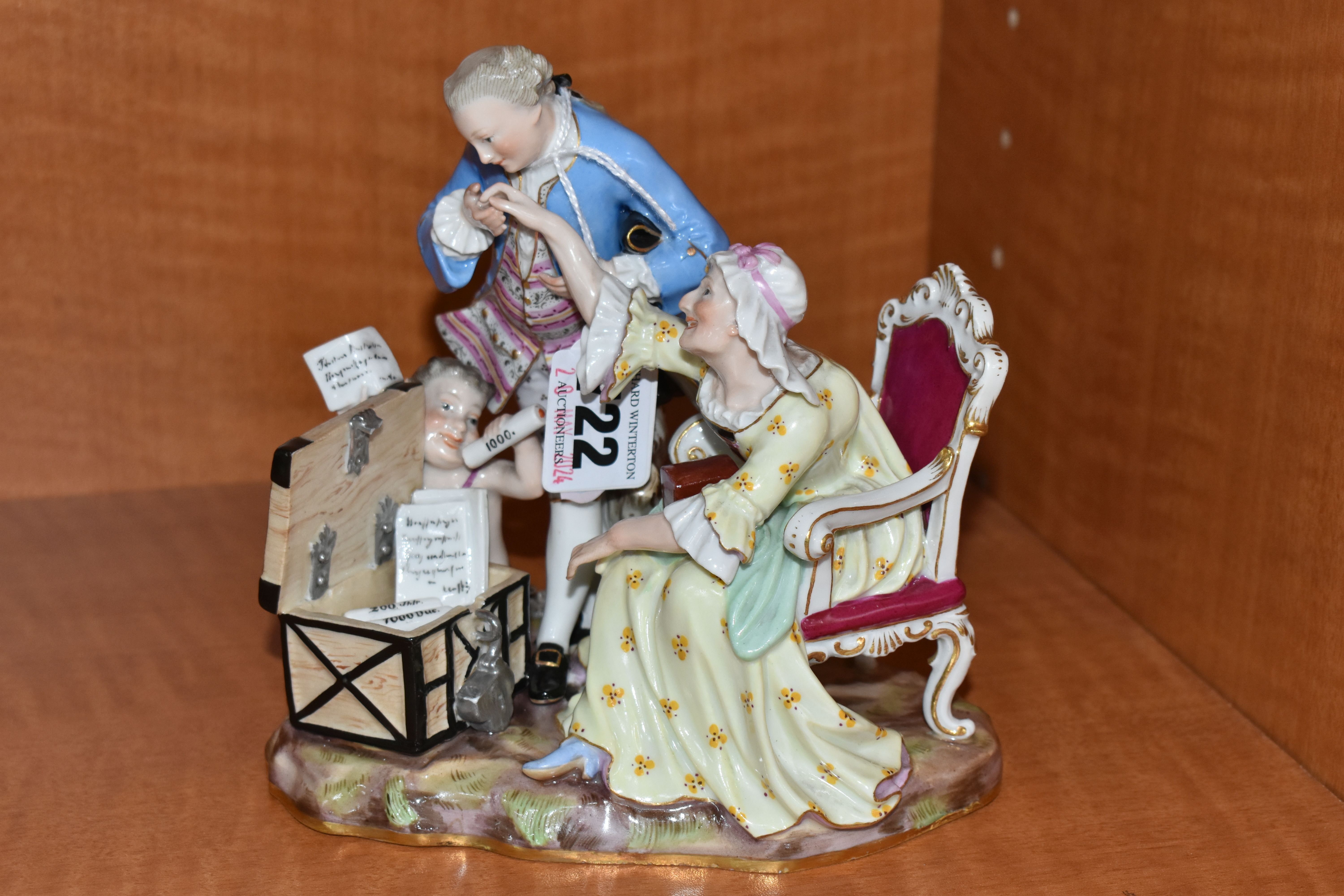 A LATE 19TH CENTURY MEISSEN SATIRICAL PORCELAIN FIGURE GROUP OF AN OLD LADY AND HER YOUNG LOVER
