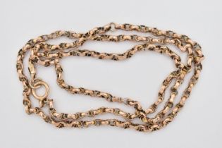 A YELLOW METAL CHAIN, faceted belcher chain fitted with a spring clasp, tag stamped 9ct, length
