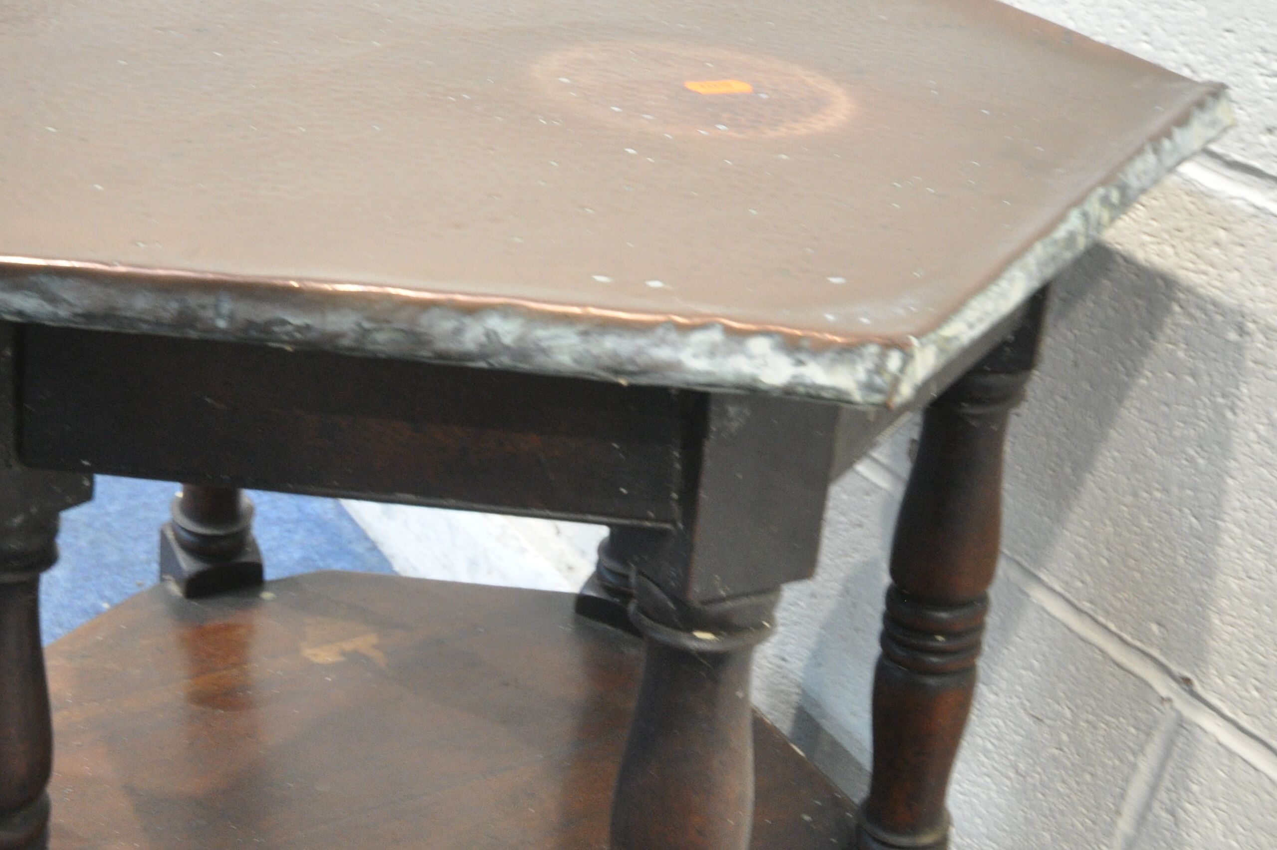 AN ARTS AND CRAFTS OAK HEXAGONAL OCCASIONAL TABLE, with a beaten copper top, raised on block and - Image 3 of 4