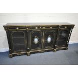 A 19TH CENTURY EBONISED AND GILT BRASS CREDENZA, with four moulded tops supporting Corinthian