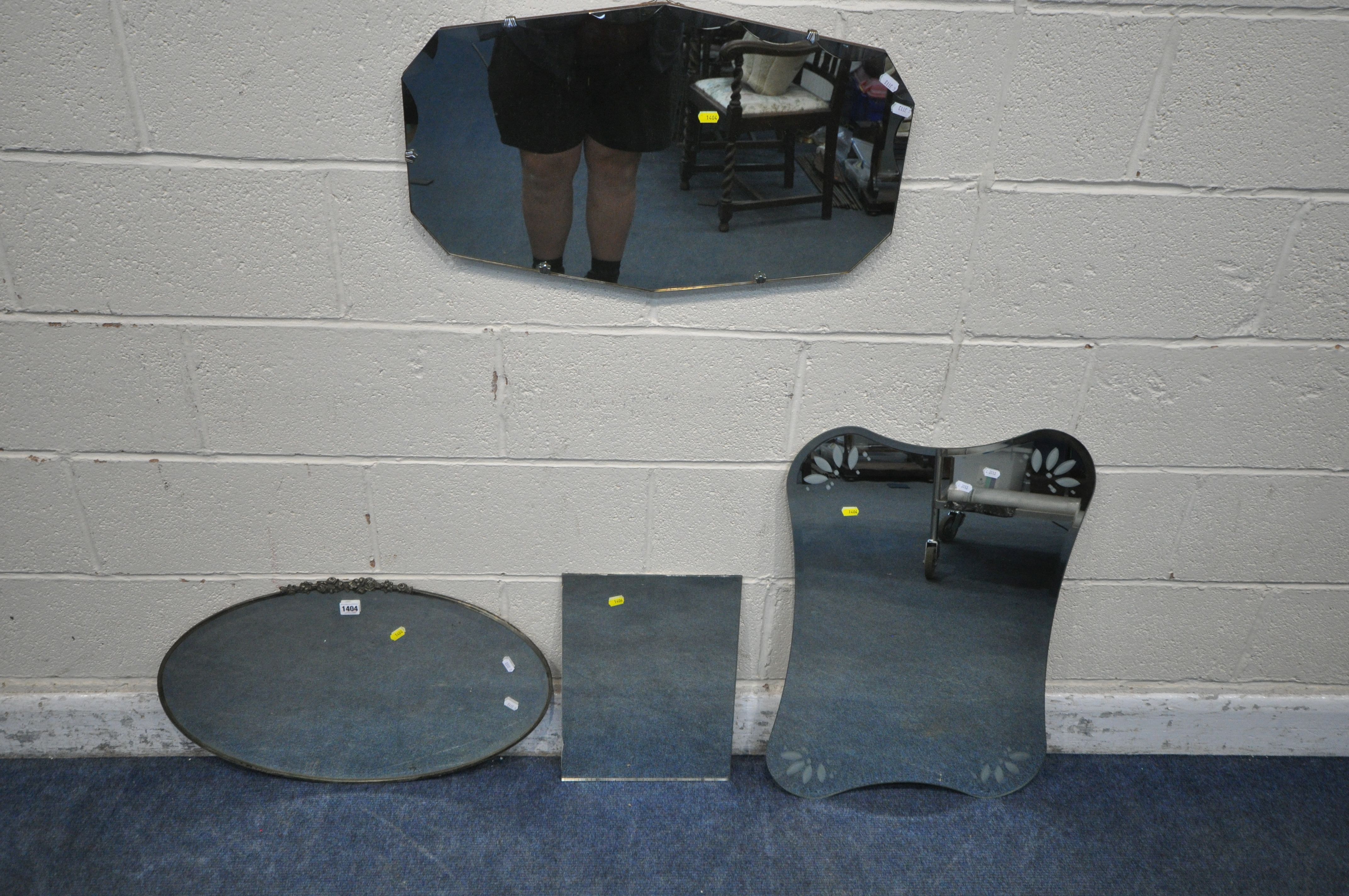 AN OVAL BEVELLED EDGE WALL MIRROR, a frameless mirror, along with two mirror panes (condition