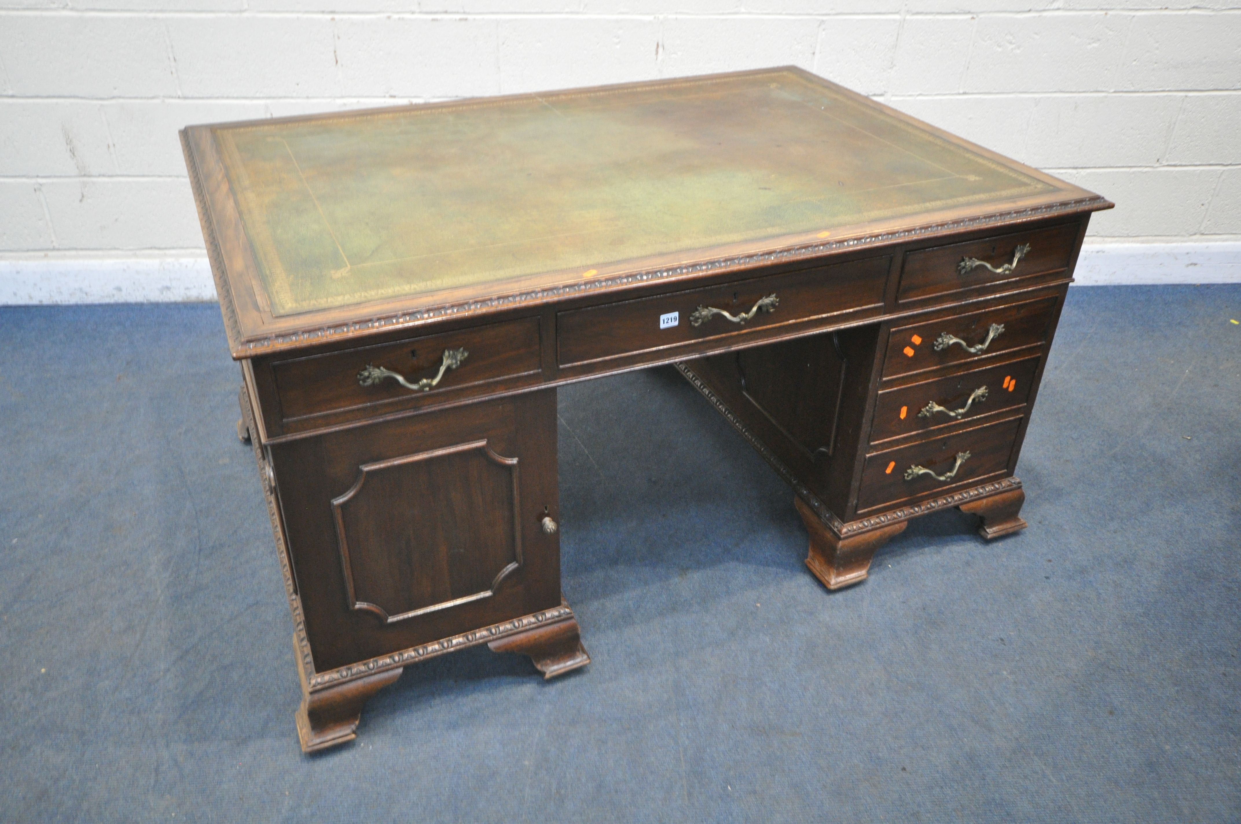 A REPRODUCTION GEORGIAN STYLE MAHOGANY PARTNERS DESK, with a green and tooled gilt leather writing