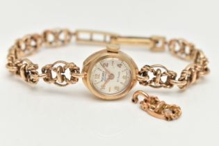 A 9CT GOLD LADIES WRISTWATCH, hand wound movement, round dial signed 'Rotary', Arabic and baton