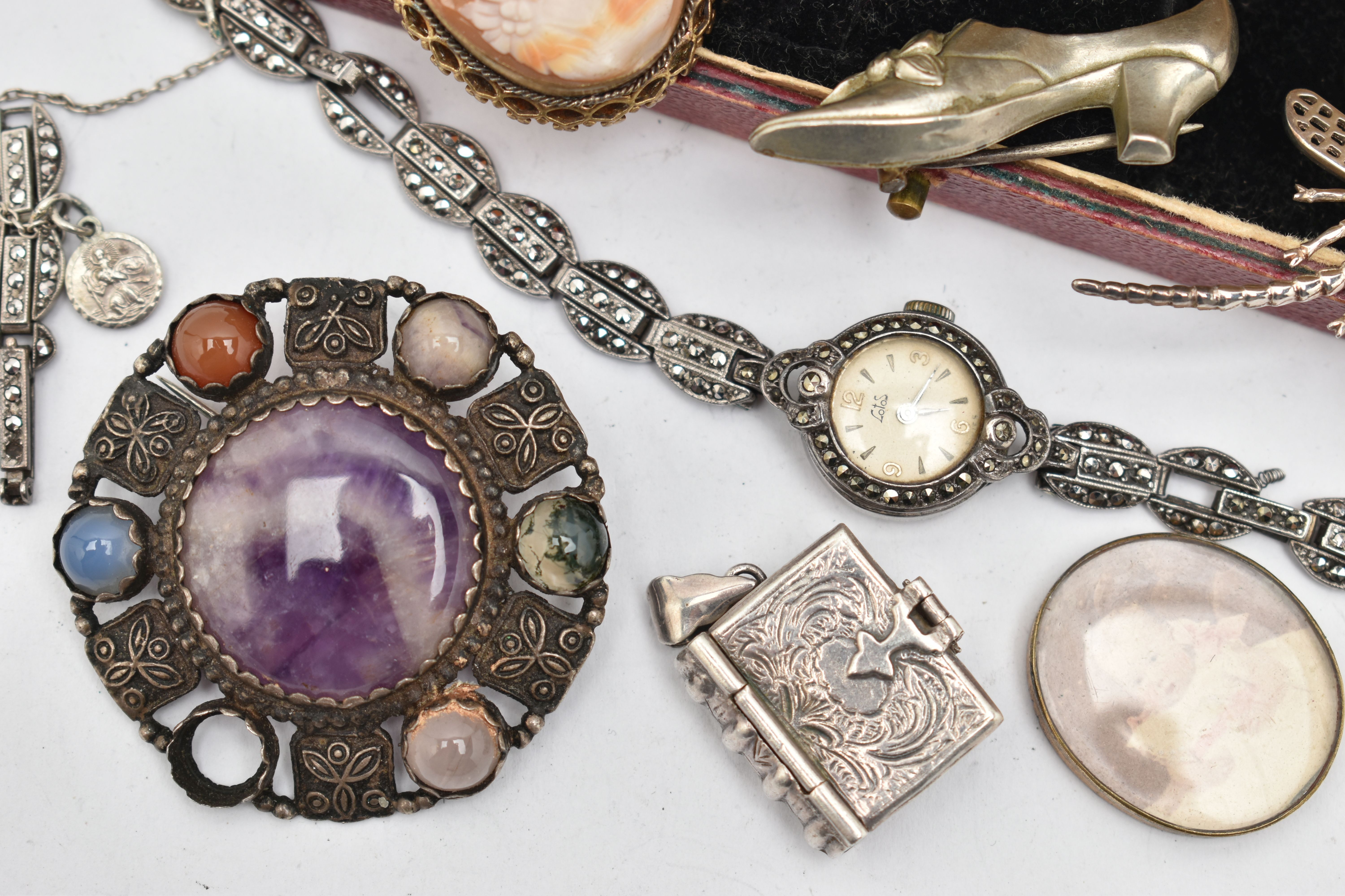 SEVEN ITEMS OF JEWELLERY, to include a ladies white metal and marcasite manual wind wristwatch, dial - Image 2 of 4