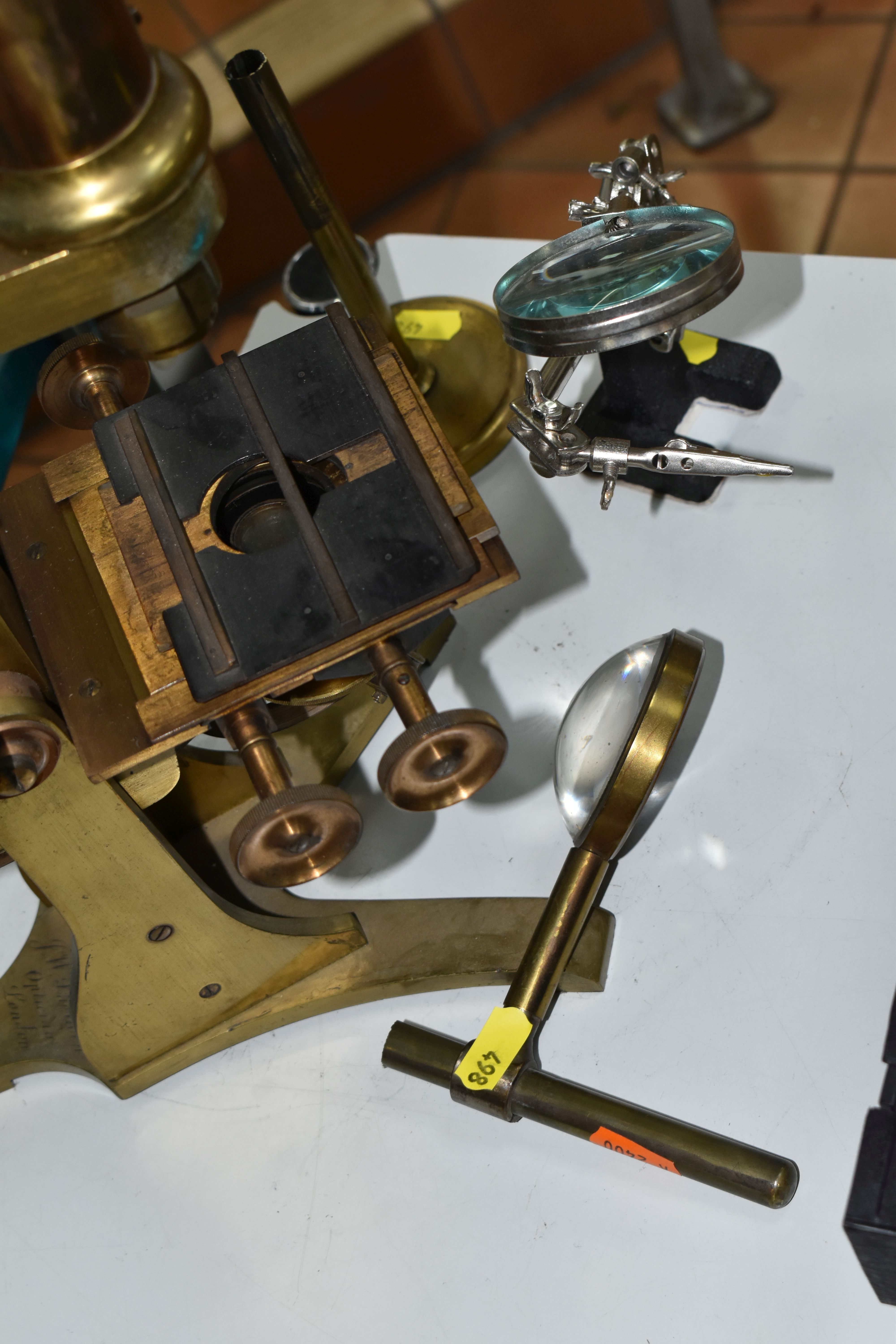A LARGE BRASS VICTORIAN MICROSCOPE AND OTHER OPTICAL EQUIPMENT, a large double eyepiece microscope - Image 8 of 8