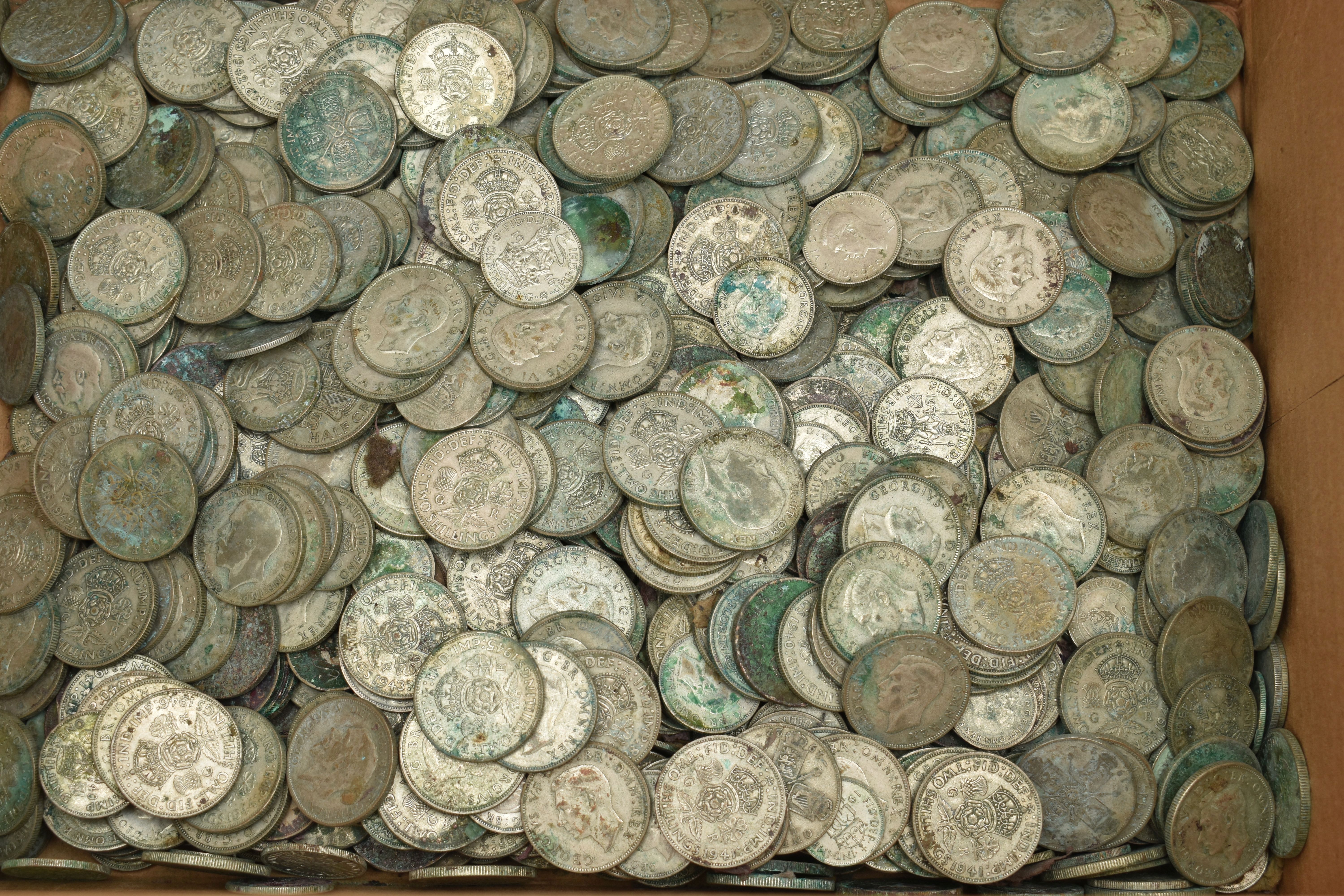 A CARDBOARD BOX CONTAINING 20TH CENTURY .500 SILVER COINS, with over 6000 grams of mostly Florin