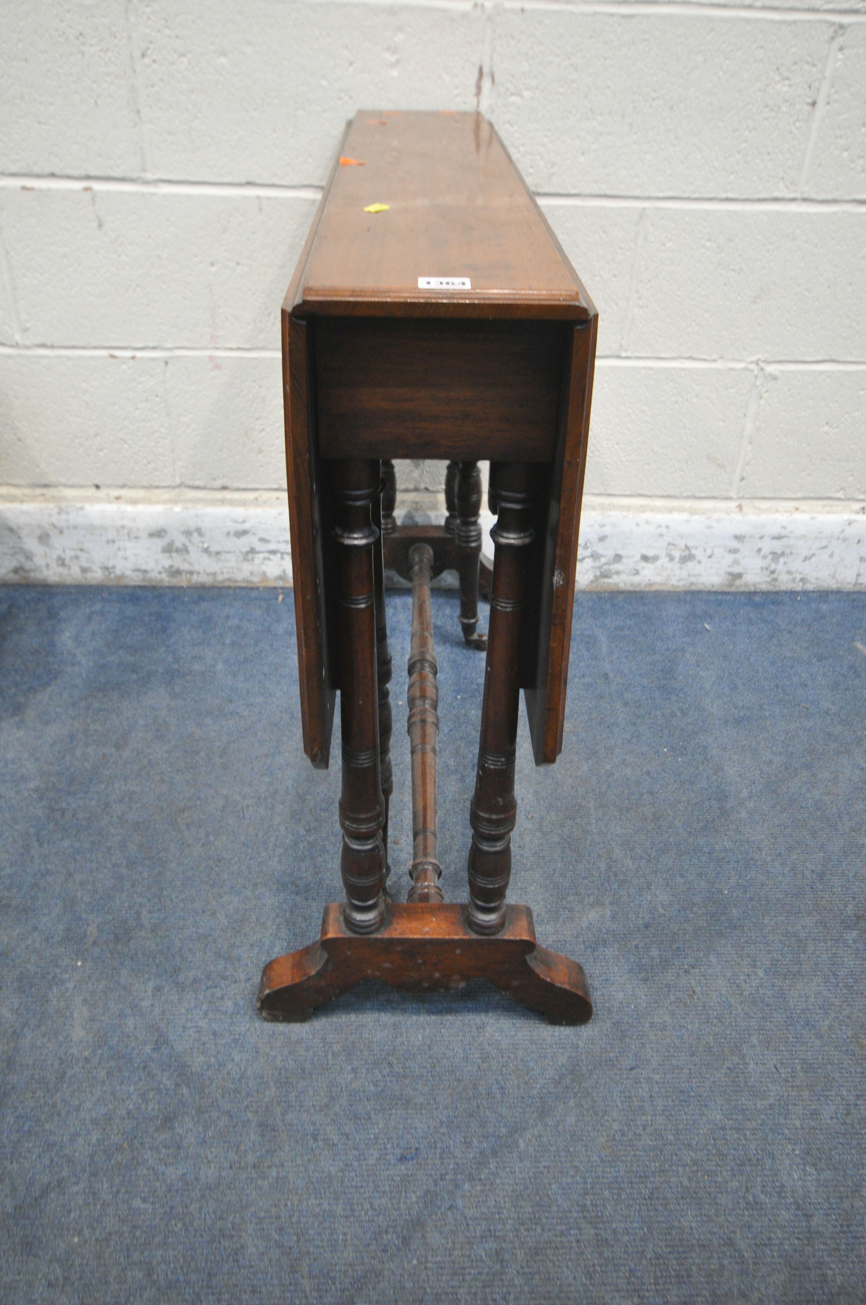 AN EDWARDIAN MAHOGANY SUTHERLAND TABLE, raised on turned supports and shaped feet, open width 91cm x - Image 3 of 6