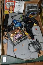 PLAYSTATION CONSOLE WITH GAMES AND ACCESSORIES, includes The World Is Not Enough, Jungle Book Groove