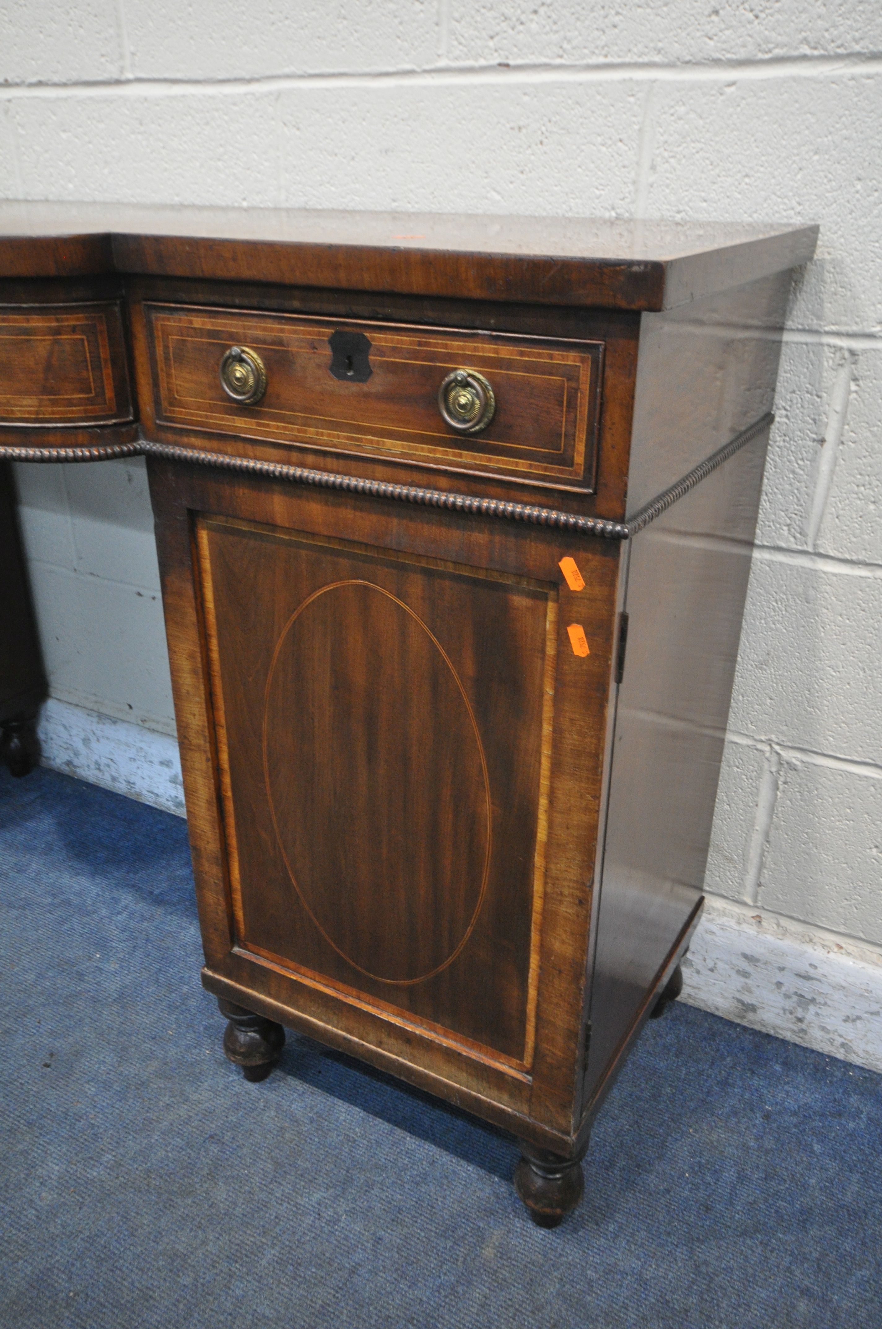 A GEORGIAN MAHOGANY AND CROSSBANDED PEDESTAL SIDEBOARD, central bowfront section, three frieze - Image 2 of 5