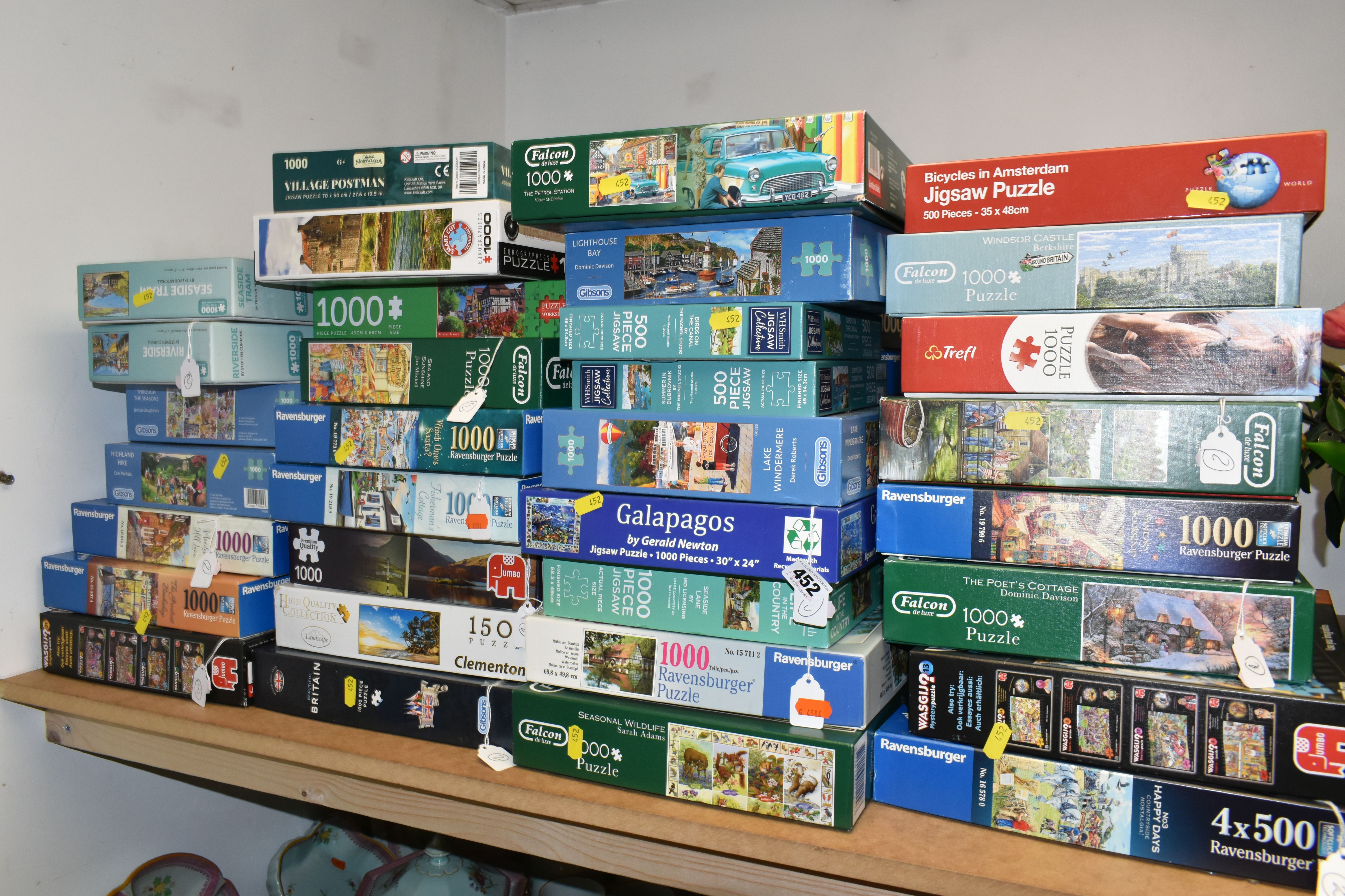 A COLLECTION OF MODERN BOXED JIGSAWS, to include examples by Ravensburger, Jumbo (including Wasgij),