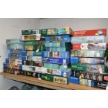 A COLLECTION OF MODERN BOXED JIGSAWS, to include examples by Ravensburger, Jumbo (including Wasgij),