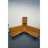 A PINE CORNER BENCH, with a later corner unit to the corner, length 155cm x depth of seat 45cm x