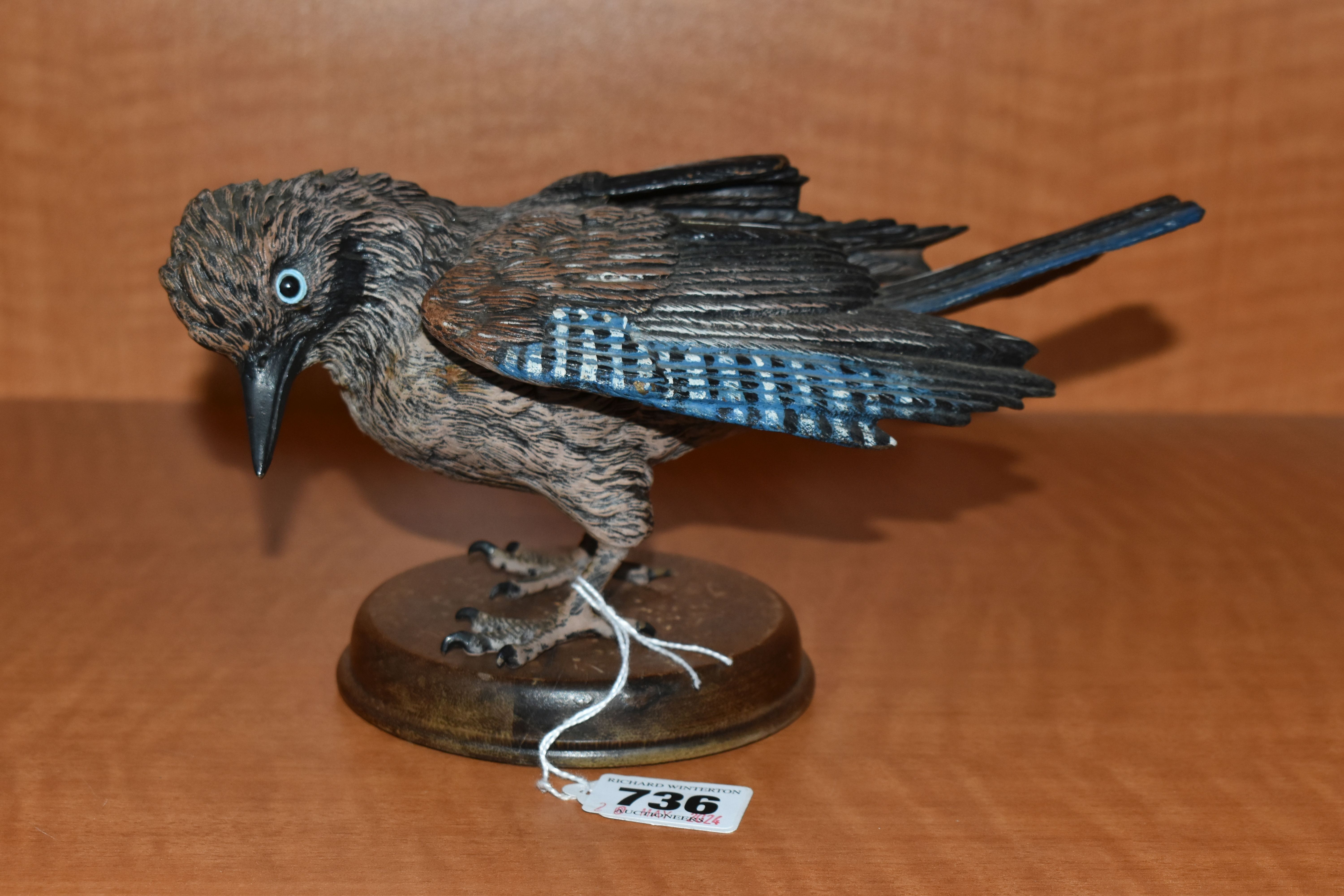A MODERN COLD PAINTED BRONZE NEAR LIFE SIZE MODEL OF A JAY, with wings partly splayed and head