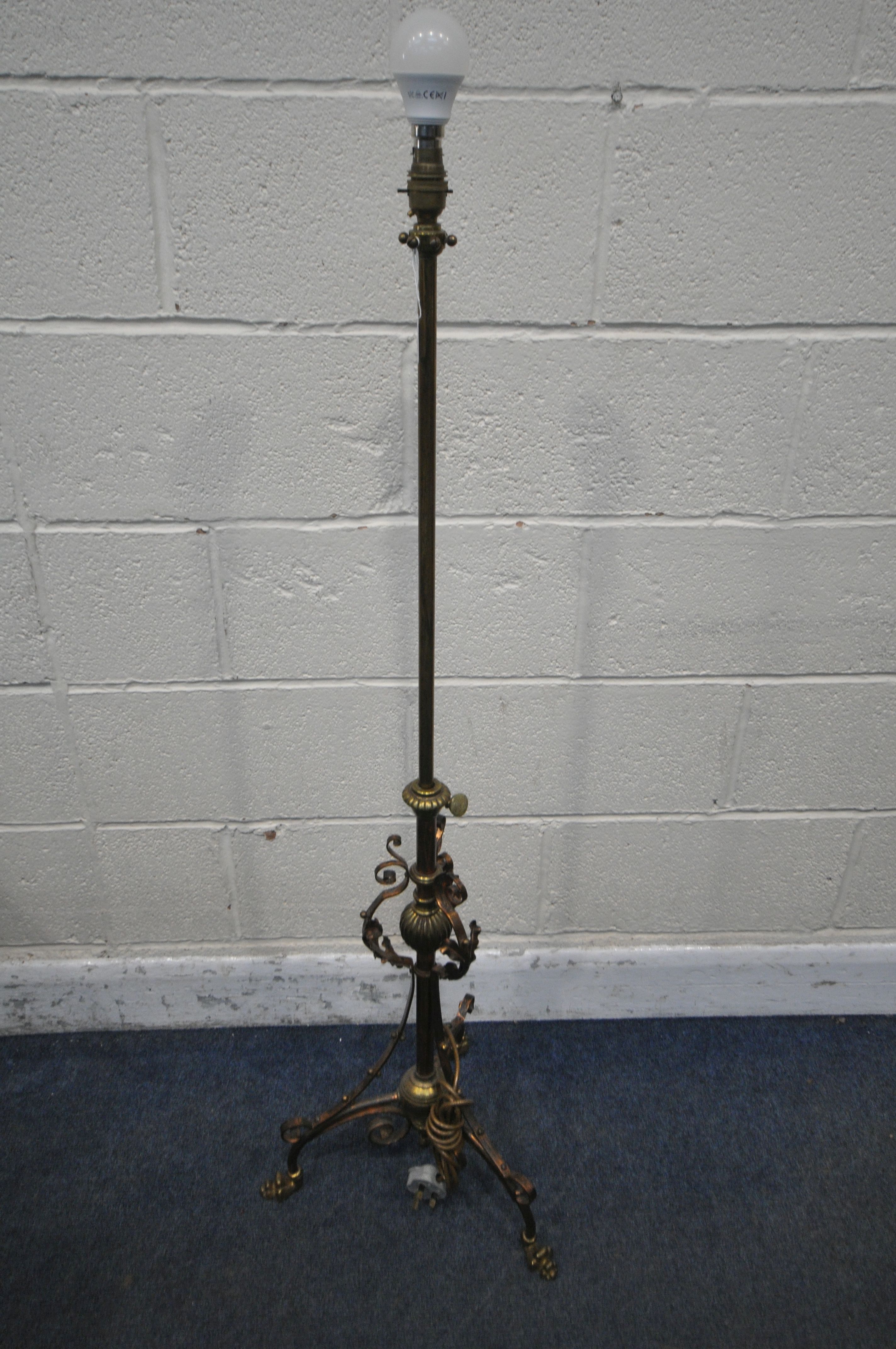 AN ART NOUVEAU BRASS AND COPPER TELESCOPIC STANDARD LAMP, height