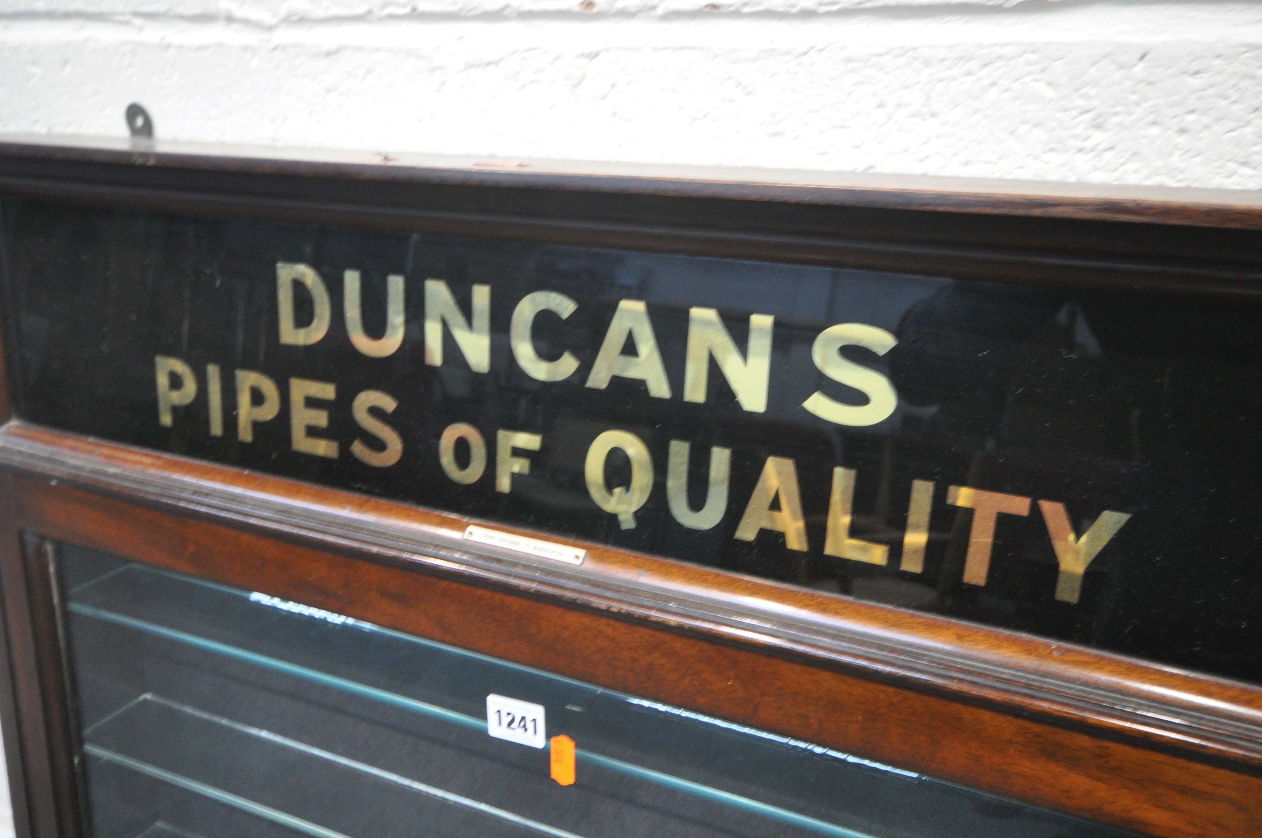 AN EARLY 20TH CENTURY MAHOGANY SINGLE DOOR DUNCAN'S PIPES OF QUALITY DISPLAY CASE, enclosing seven - Image 3 of 6