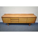 WHITE AND NEWTON LTD, A MID CENTURY TEAK SIDEBOARD, fitted with a fall front door, double cupboard