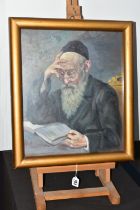 A MID 20TH CENTURY PORTRAIT OF A RABBI, a seated Rabbi is reading from a book, his glasses are