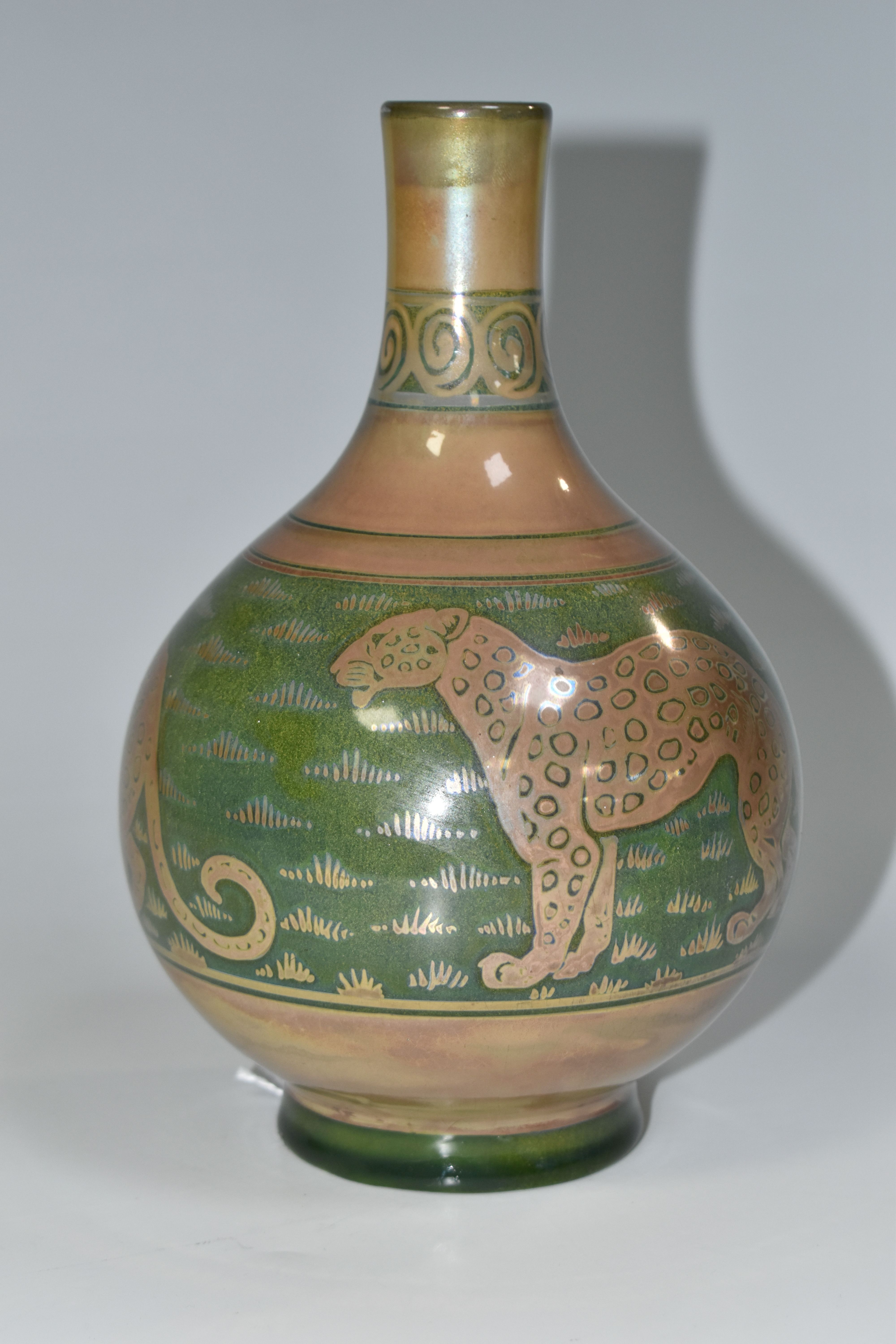 A PILKINGTON'S VASE, decorated with leopards on a mid-green ground, P and Bs impressed mark to