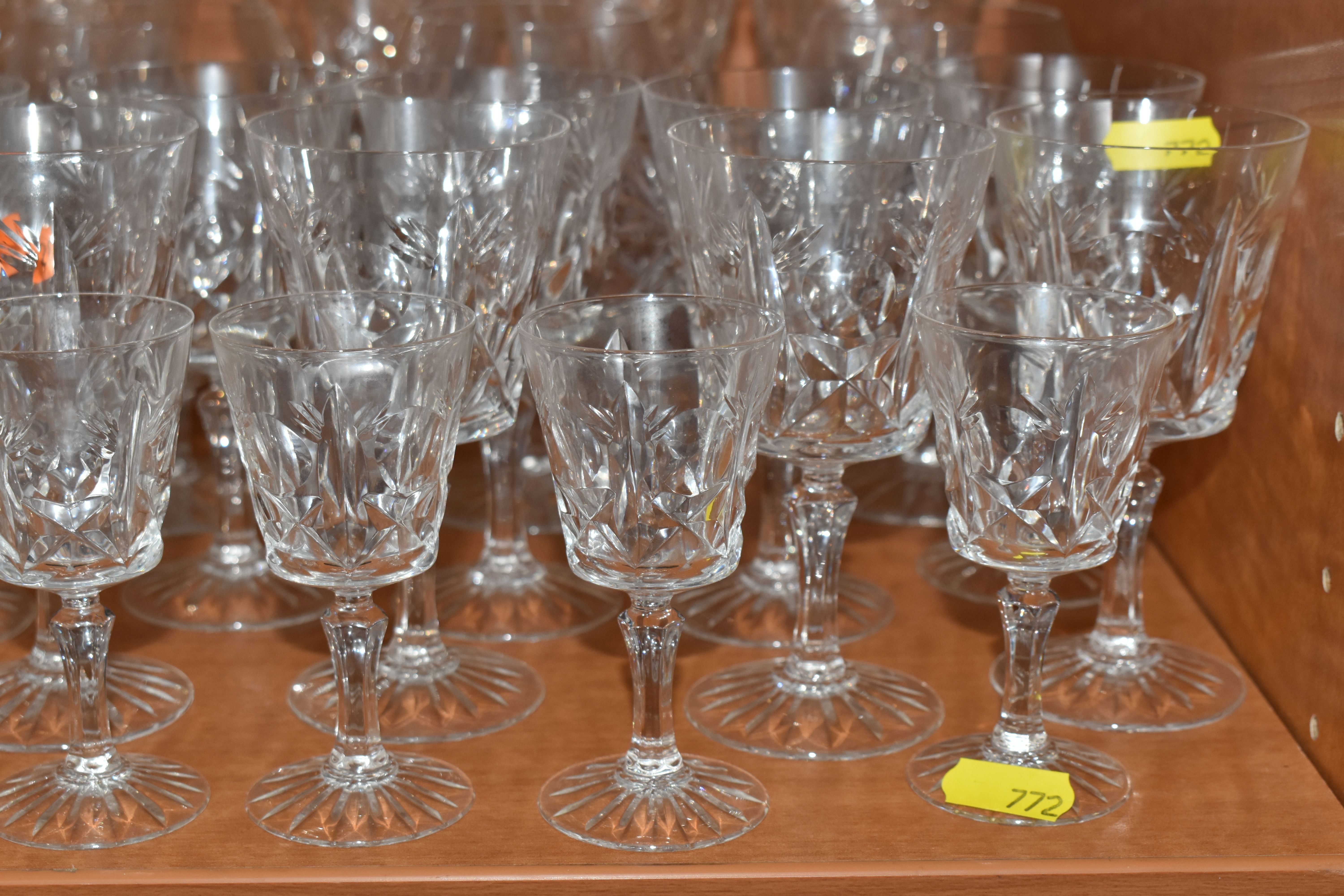 A COLLECTION OF ASSORTED DRINKING GLASSES. including a set of twelve champagne flutes, a set of - Image 4 of 7