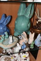 A GROUP OF BOURNE DENBY RABBITS, comprising a very large Marmaduke green snub nose rabbit (badly