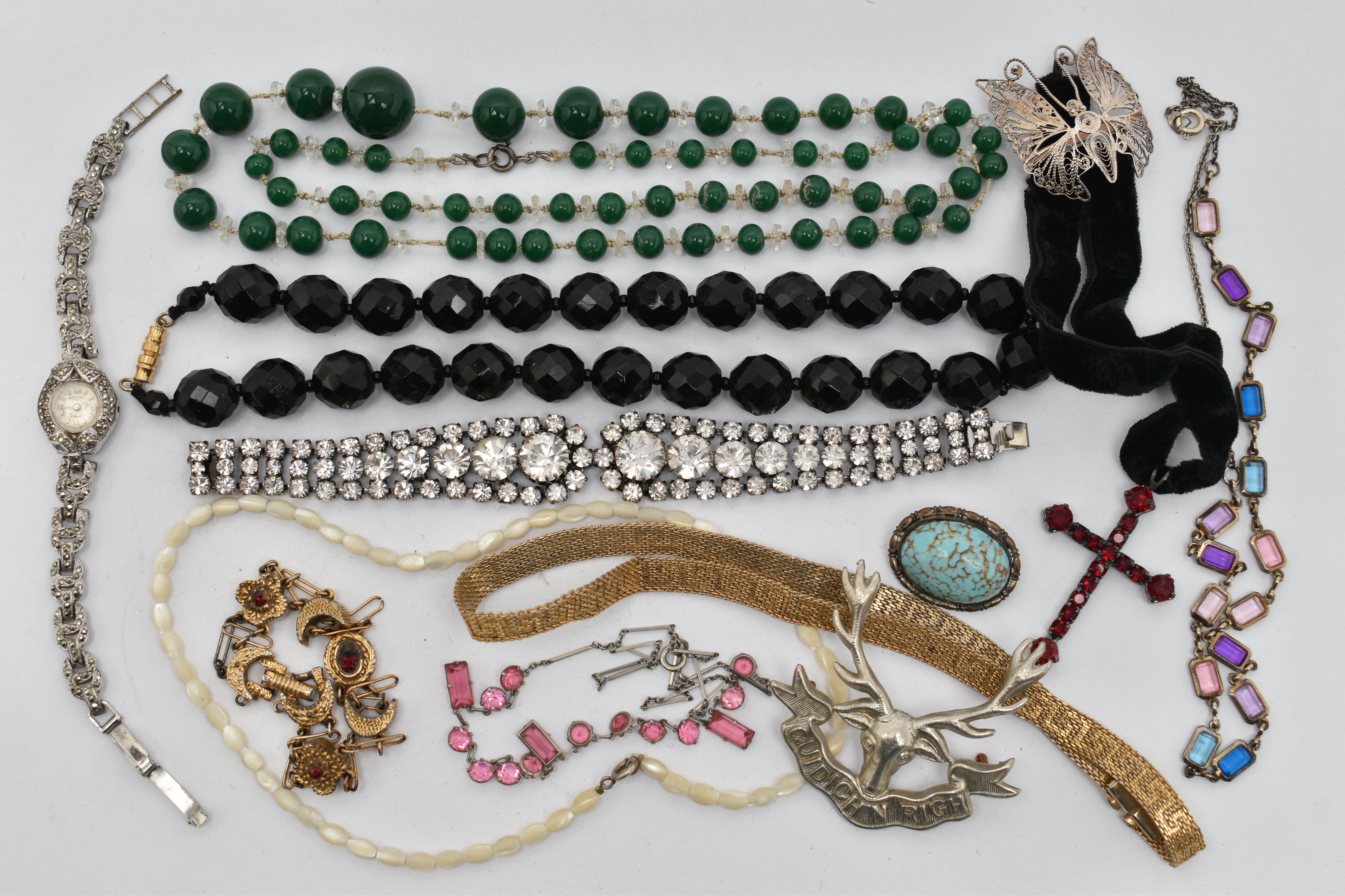 A BAG OF COSTUME JEWELLERY, two paste set white metal necklaces, a green beaded necklace, a mother