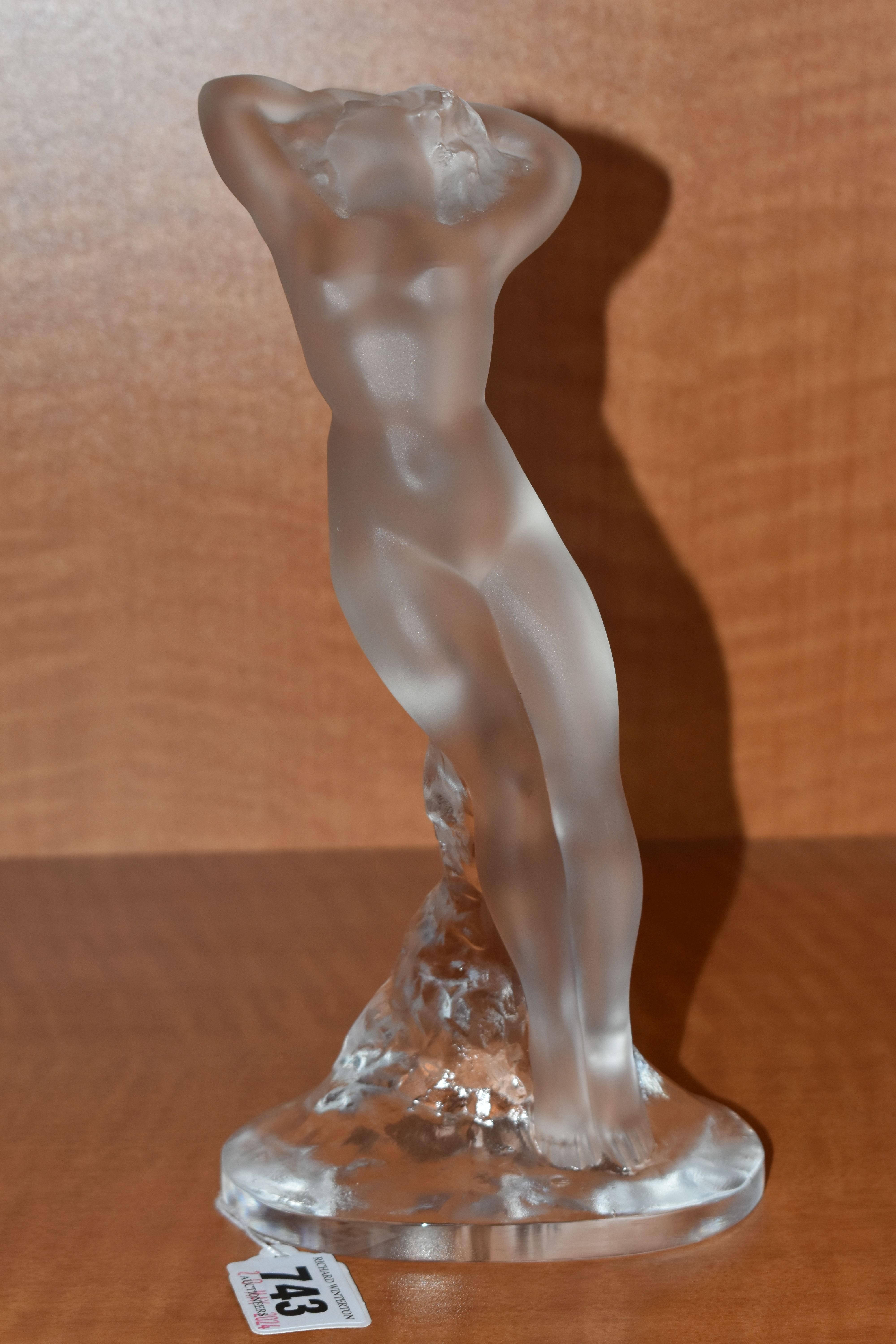 A SECOND HALF 20TH CENTURY LALIQUE FROSTED GLASS FIGURE DANSEUSE BRAS LEVES, on a clear oval base,