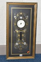 A KEN BROADBENT CLOCK MONTAGE WITH QUARTZ MOVEMENT, in a gilt frame and glazed, overall height